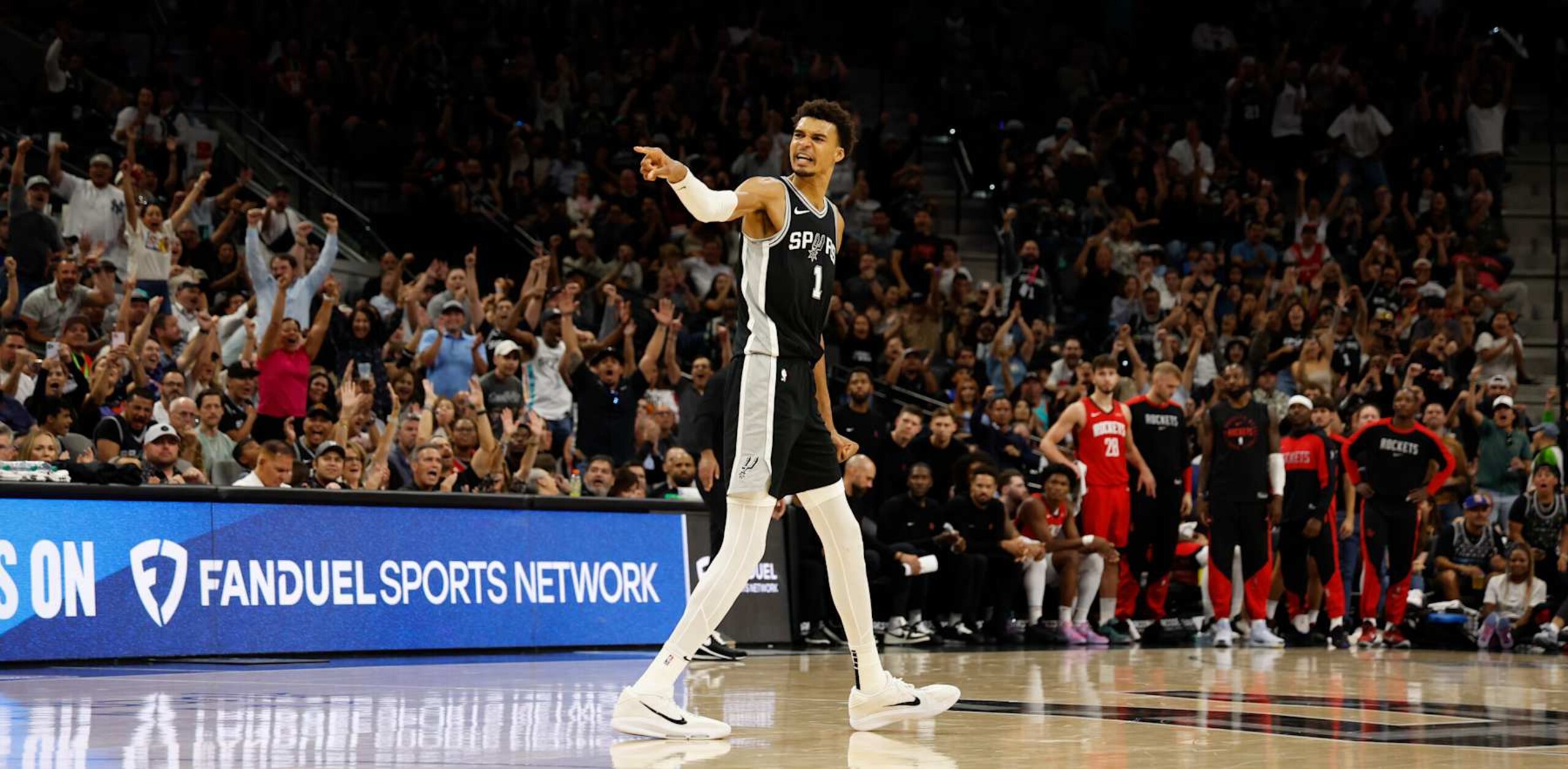 SAN ANTONIO, TX - OCTOBER 28: Victor Wembanyama #1 of the San Antonio Spurs reacts after a basket against the Houston Rockets in the second half at Frost Bank Center on October 28, 2024 in San Antonio, Texas. NOTE TO USER: User expressly acknowledges and agrees that, by downloading and or using this photograph, User is consenting to terms and conditions of the Getty Images License Agreement. (Photo by Ronald Cortes/Getty Images)