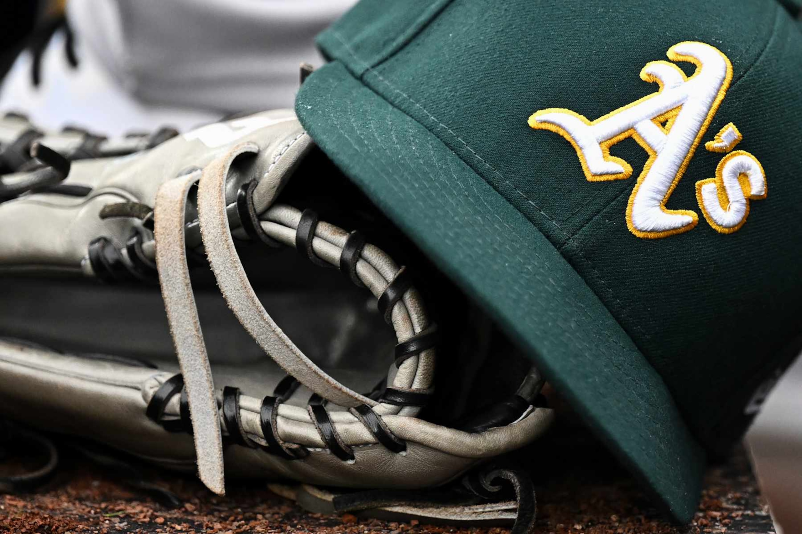 BALTIMORE, MARYLAND - APRIL 27, 2024: A closeup view of an Oakland Athletics hat during the fifth inning against the Baltimore Orioles at Oriole Park at Camden Yards on April 27, 2024 in Baltimore, Maryland. (Photo by Chris Bernacchi/Diamond Images via Getty Images) BALTIMORE, MARYLAND - APRIL 27, 2024: A closeup view of an Oakland Athletics hat during the fifth inning against the Baltimore Orioles at Oriole Park at Camden Yards on April 27, 2024 in Baltimore, Maryland. (Photo by Chris Bernacchi/Diamond Images via Getty Images)