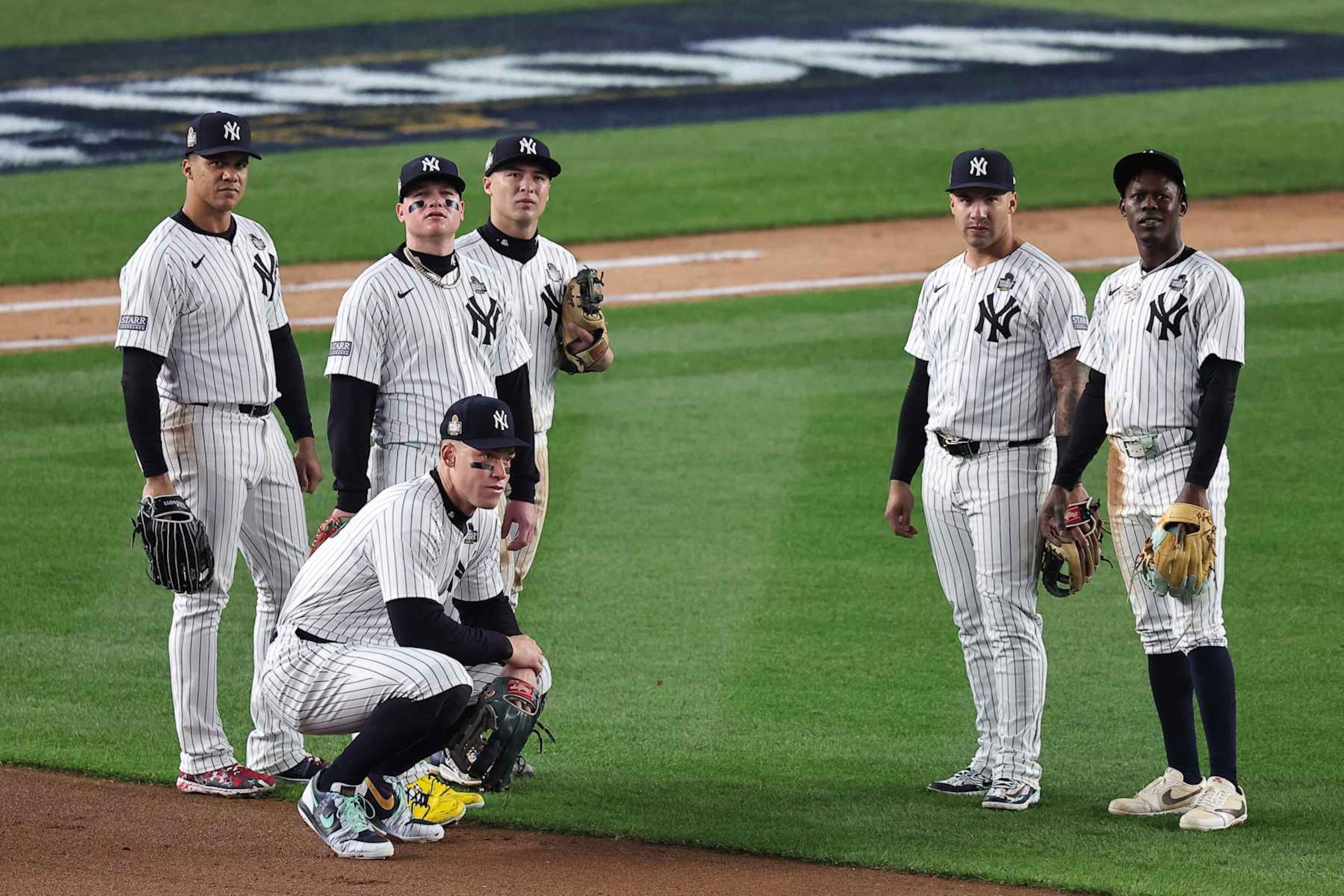 NEW YORK, NY - OCTOBER 29:   Juan Soto #22, Alex Verdugo #24, Aaron Judge #99, Anthony Volpe #11, Gleyber Torres #25 and Jazz Chisholm Jr. #13 of the New York Yankees look on in the fourth inning during Game 4 of the 2024 World Series presented by Capital One between the Los Angeles Dodgers and the New York Yankees at Yankee Stadium on Tuesday, October 29, 2024 in New York, New York. (Photo by Dustin Satloff/MLB Photos via Getty Images)