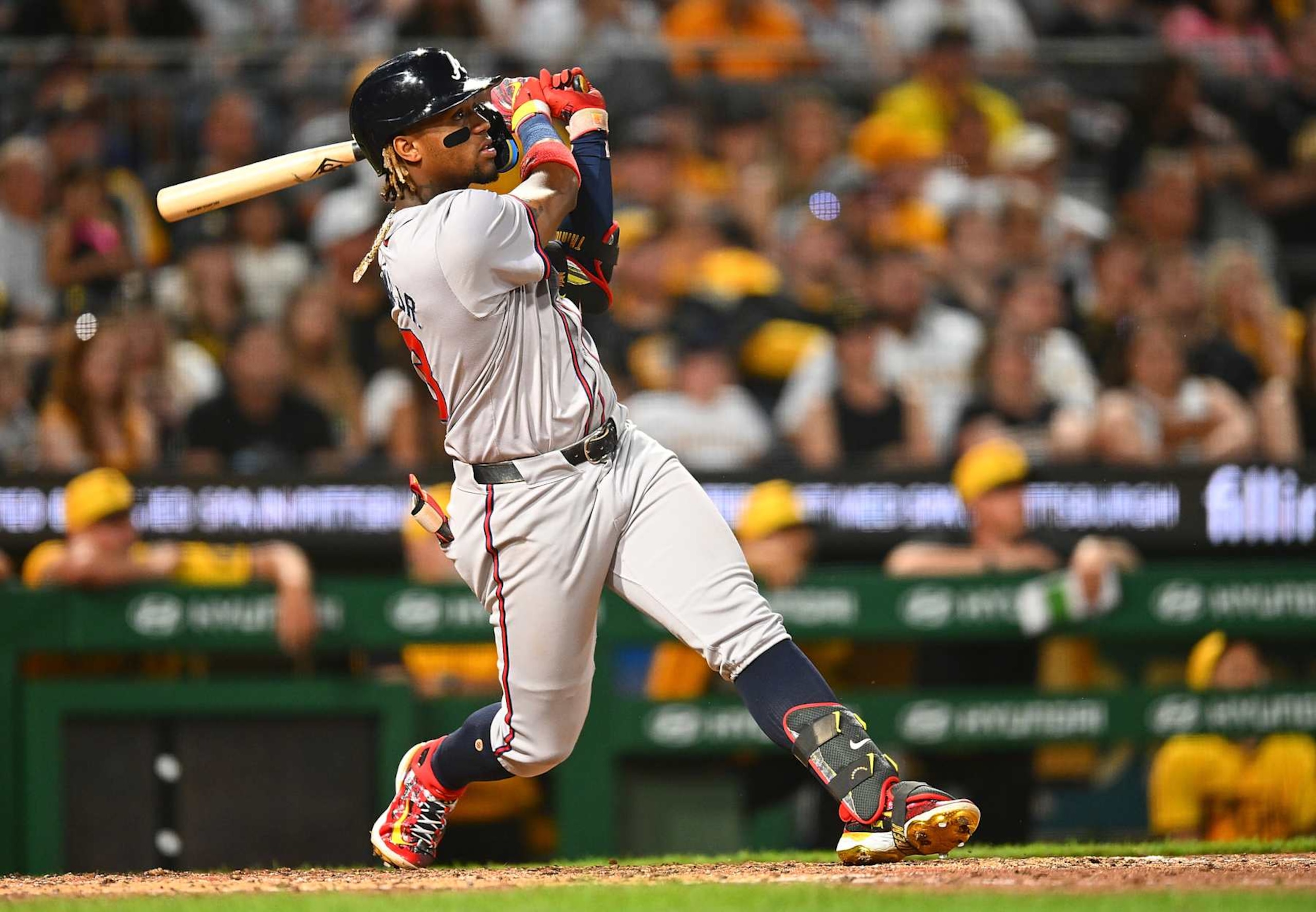 PITTSBURGH, PENNSYLVANIA - MAY 24:  Ronald Acuña Jr. #13 of the Atlanta Braves hits a three-run home run during the eighth inning against the Pittsburgh Pirates at PNC Park on May 24, 2024 in Pittsburgh, Pennsylvania. (Photo by Joe Sargent/Getty Images)