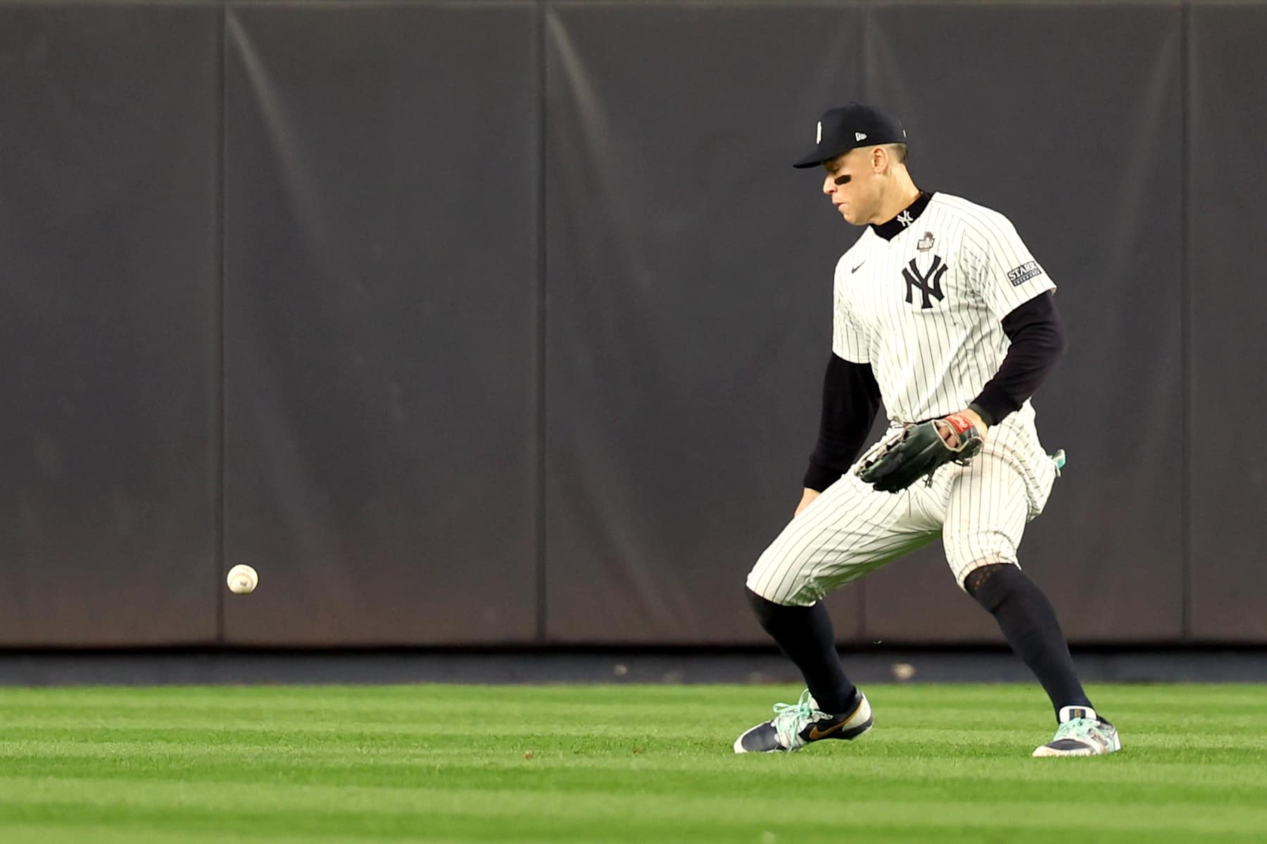BRONX, NEW YORK - OCTOBER 30, 2024: New York Yankees outfielder Aaron Judge (99) makes an error in the fifth inning. Game 5 of the World Series against the Yankees at Yankees Stadium in New York City Tuesday, October 29 2024. (Robert Gauthier/Los Angeles Times via Getty Images)