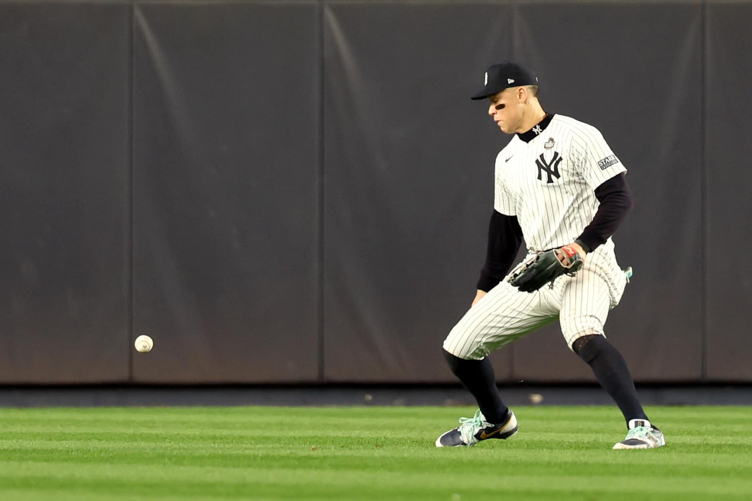 BRONX, NEW YORK - OCTOBER 30, 2024: New York Yankees outfielder Aaron Judge (99) makes an error in the fifth inning. Game 5 of the World Series against the Yankees at Yankees Stadium in New York City Tuesday, October 29 2024. (Robert Gauthier/Los Angeles Times via Getty Images)