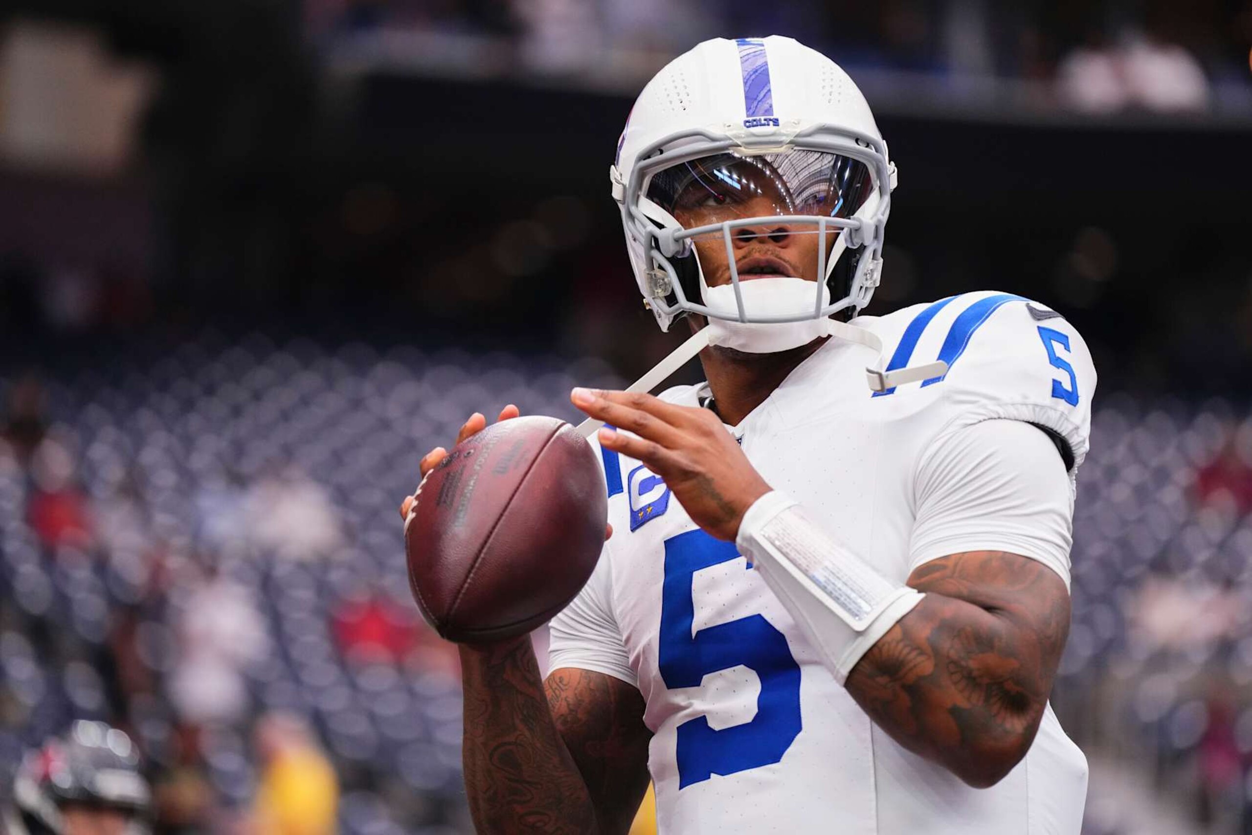 HOUSTON, TX - OCTOBER 27: Anthony Richardson #5 of the Indianapolis Colts warms up before kickoff against the Houston Texans during an NFL football game at NRG Stadium on October 27, 2024 in Houston, Texas. (Photo by Cooper Neill/Getty Images) HOUSTON, TX - OCTOBER 27: Anthony Richardson #5 of the Indianapolis Colts warms up before kickoff against the Houston Texans during an NFL football game at NRG Stadium on October 27, 2024 in Houston, Texas. (Photo by Cooper Neill/Getty Images)