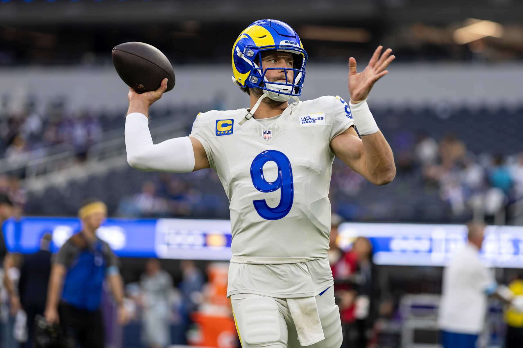 INGLEWOOD, CALIFORNIA - OCTOBER 24: Matthew Stafford #9 of the Los Angeles looks to pass as he warms up during an NFL Football game against the Minnesota Vikings at SoFi Stadium on October 24, 2024 in Inglewood, California. (Photo by Michael Owens/Getty Images)