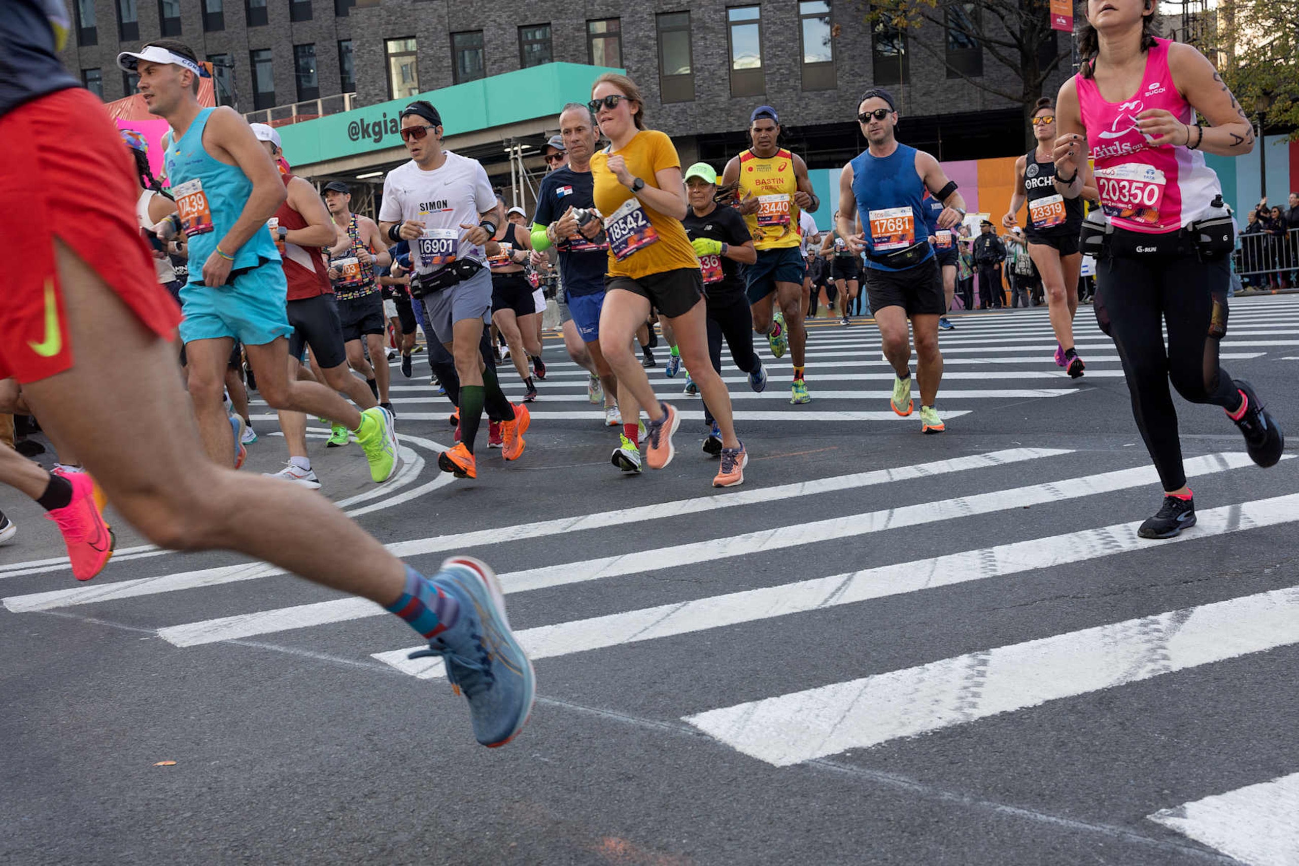 NEW YORK, NY - NOVEMBER 5: Marathon runners, cheered on by crowds of pedestrians, participate in the annual  New York City Marathon on November 5, 2023, through the streets of Brooklyn, New York. Neighborhoods along the twenty six mile route come out to encourage the runners and greet friends and family in the race. (Photo by Andrew Lichtenstein/Corbis via Getty Images)