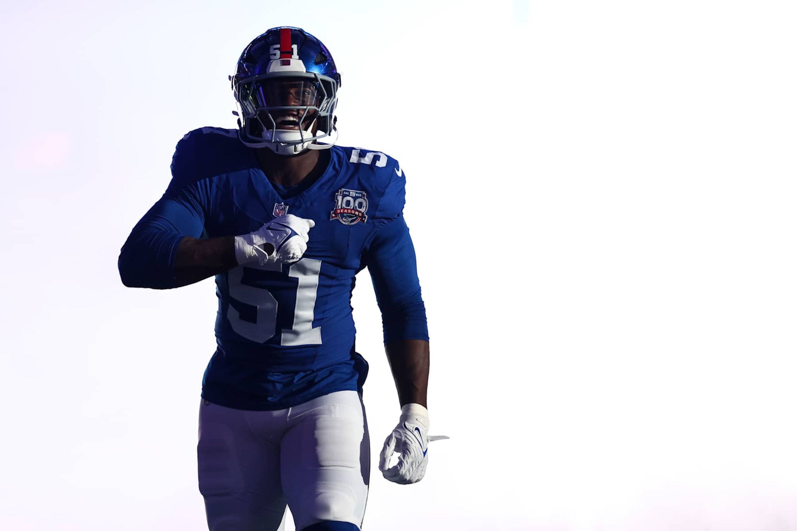 EAST RUTHERFORD, NEW JERSEY - OCTOBER 13: Azeez Ojulari #51 of the New York Giants runs onto the field prior to an NFL game against the Cincinnati Bengals at MetLife Stadium on October 13, 2024 in East Rutherford, New Jersey. (Photo by Kevin Sabitus/Getty Images)