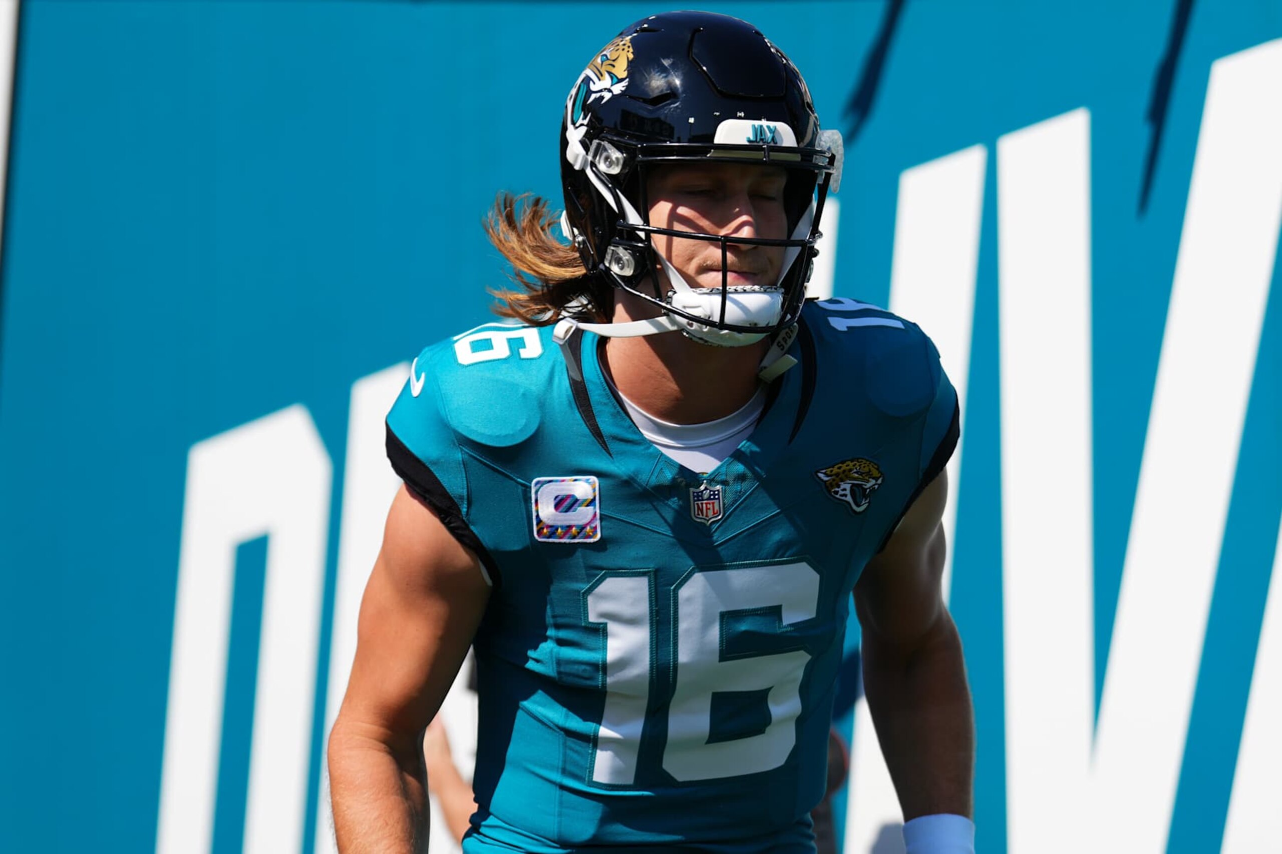JACKSONVILLE, FLORIDA - OCTOBER 27: Trevor Lawrence #16 of the Jacksonville Jaguars enters the field prior to a game against the Jacksonville Jaguars at EverBank Stadium on October 27, 2024 in Jacksonville, Florida. (Photo by Rich Storry/Getty Images)