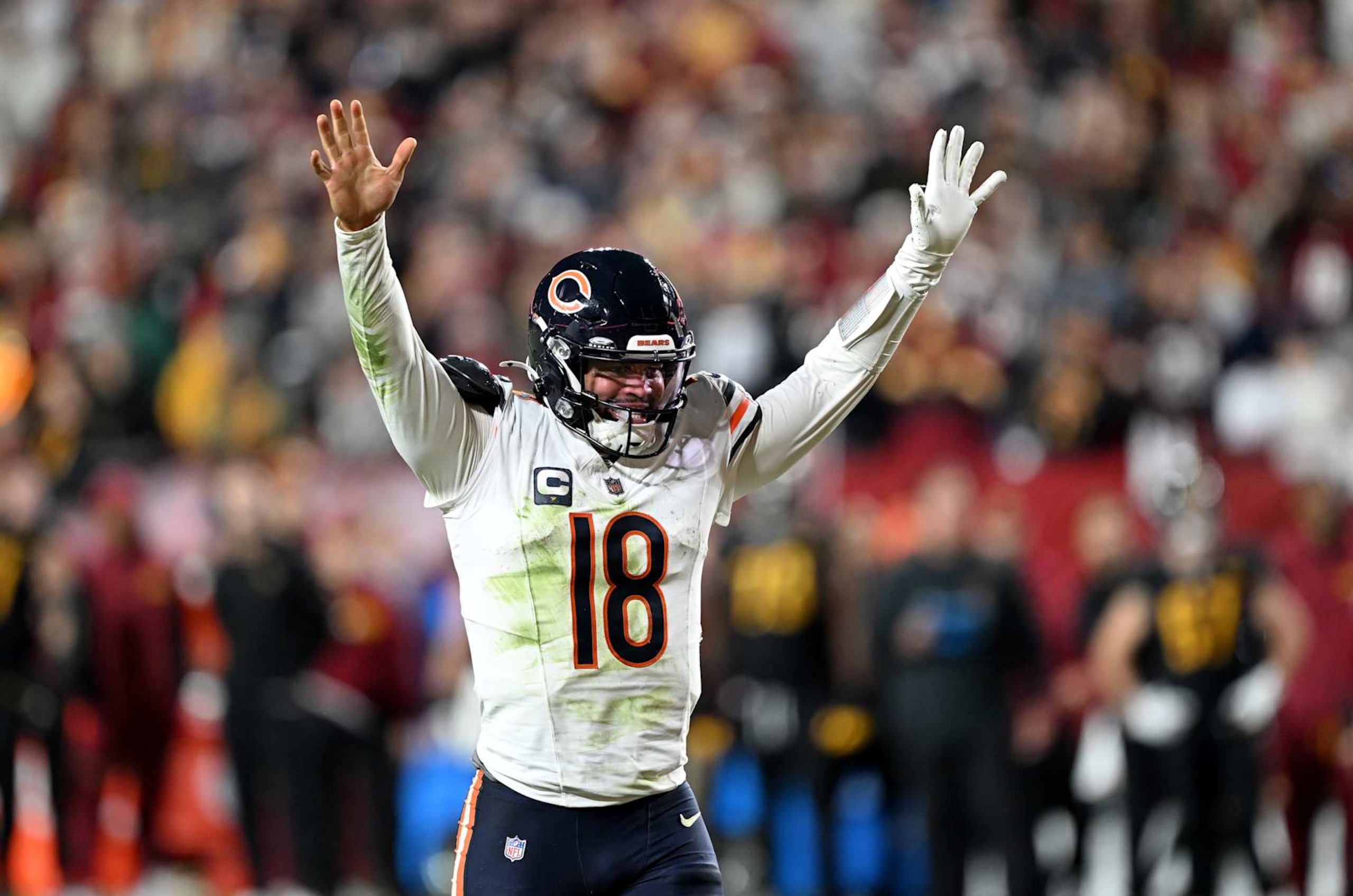 LANDOVER, MARYLAND - OCTOBER 27: Caleb Williams #18 of the Chicago Bears celebrates after his team's rushing touchdown in the fourth quarter of a game against the Washington Commanders at Northwest Stadium on October 27, 2024 in Landover, Maryland. (Photo by G Fiume/Getty Images)