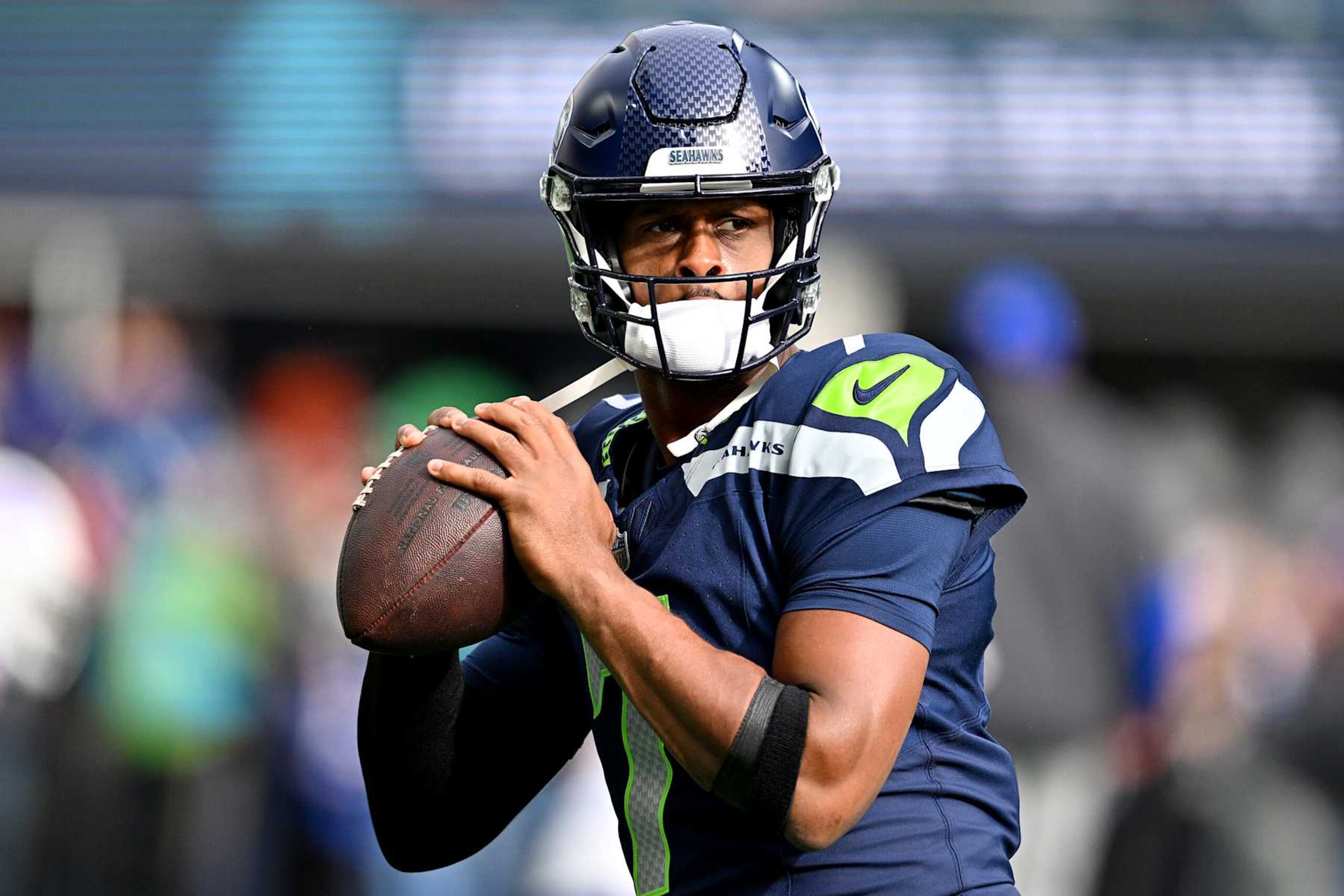 SEATTLE, WASHINGTON - OCTOBER 27: Geno Smith #7 of the Seattle Seahawks warms up before playing the Buffalo Bills at Lumen Field on October 27, 2024 in Seattle, Washington. (Photo by Jane Gershovich/Getty Images)