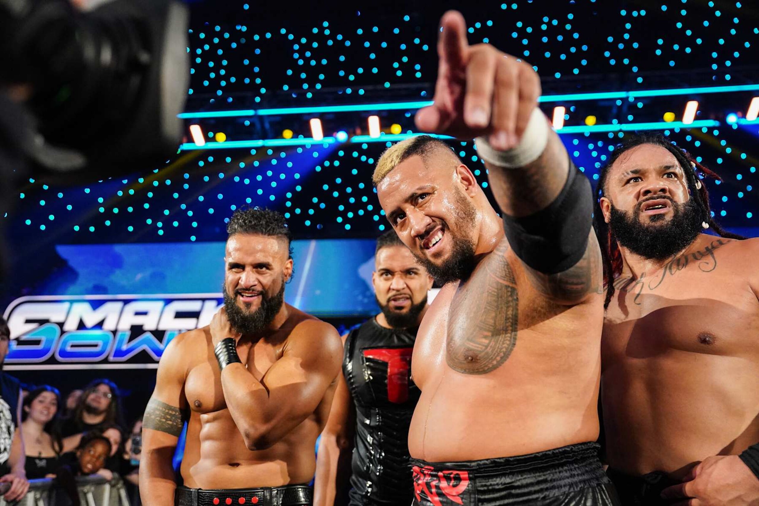 OKLAHOMA CITY, OKLAHOMA - SEPTEMBER 27: Tama Tonga, Tonga Loa, Solo Sikoa and Jacob Fatu of the Bloodline celebrate their win on the entrance ramp during WWE SmackDown at Paycom Center on September 27, 2024 in Oklahoma City, Oklahoma.  (Photo by WWE/Getty Images)
