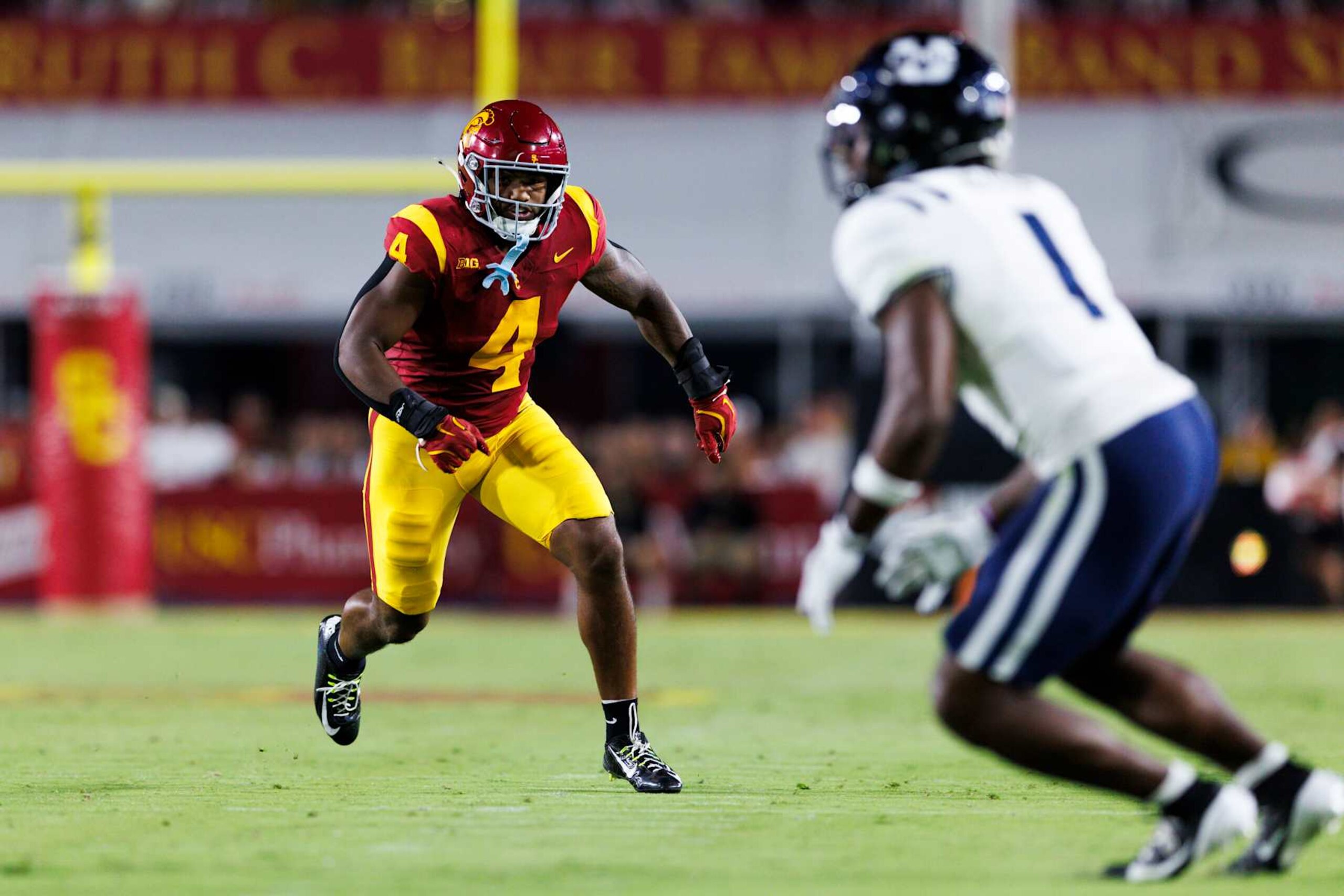 LOS ANGELES, CALIFORNIA - SEPTEMBER 7: Easton Mascarenas-Arnold #4 of the USC Trojans defends in coverage during a game against Utah State Aggies at United Airlines Field at the Los Angeles Memorial Coliseum on September 7, 2024 in Los Angeles, California. (Photo by Ric Tapia/Getty Images)