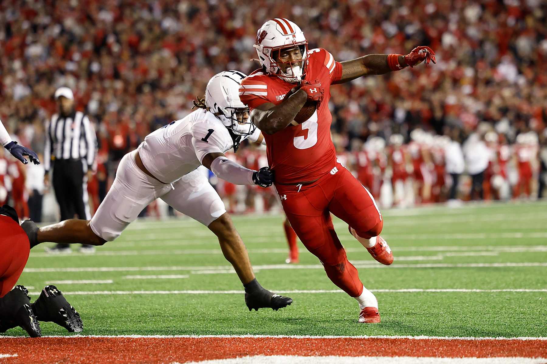 MADISON, WISCONSIN - OCTOBER 26: Tawee Walker #3 of the Wisconsin Badgers scores on a 1 yard touchdown run in the second quarter against the Penn State Nittany Lions at Camp Randall Stadium on October 26, 2024 in Madison, Wisconsin. (Photo by John Fisher/Getty Images)