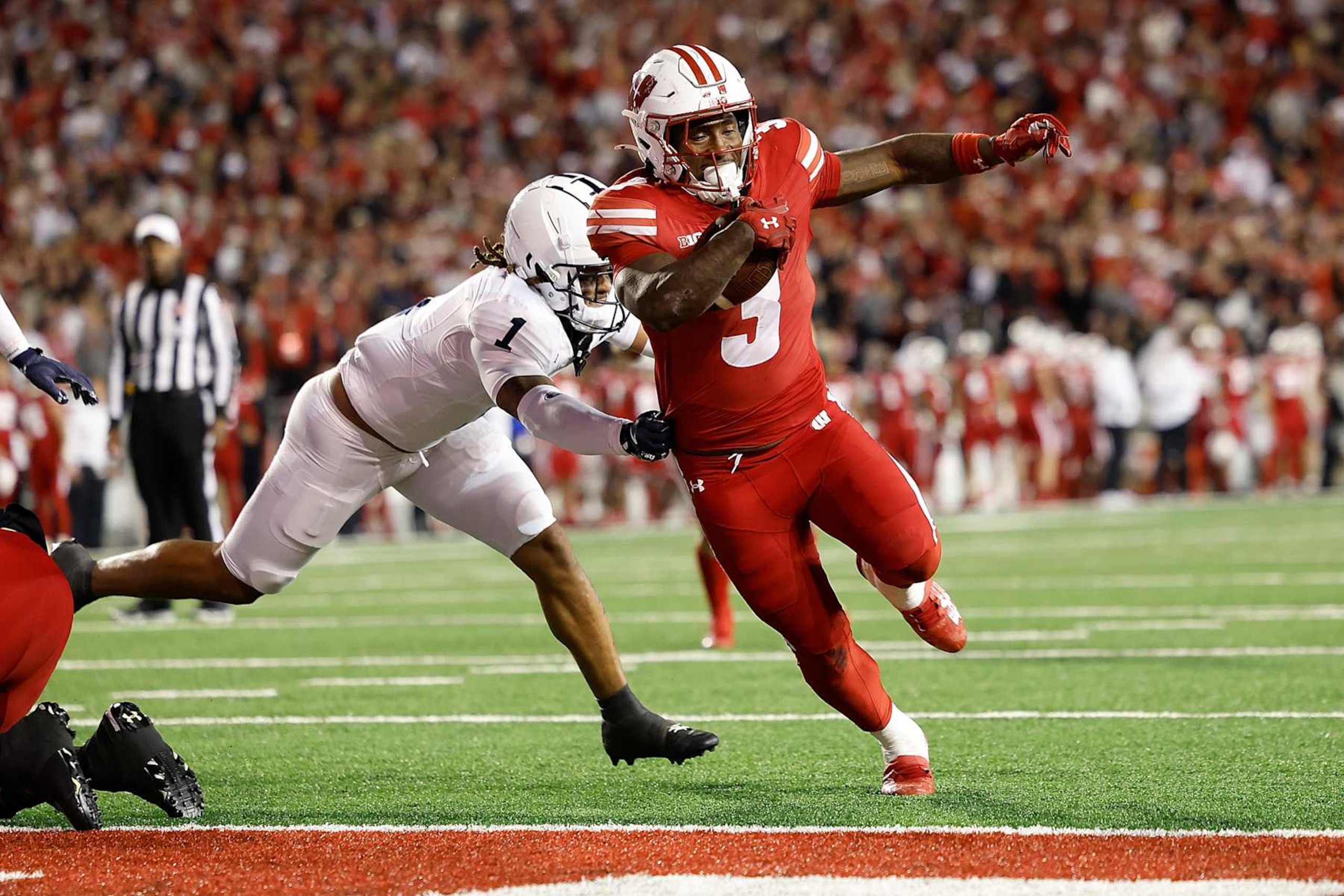 MADISON, WISCONSIN - OCTOBER 26: Tawee Walker #3 of the Wisconsin Badgers scores on a 1 yard touchdown run in the second quarter against the Penn State Nittany Lions at Camp Randall Stadium on October 26, 2024 in Madison, Wisconsin. (Photo by John Fisher/Getty Images)