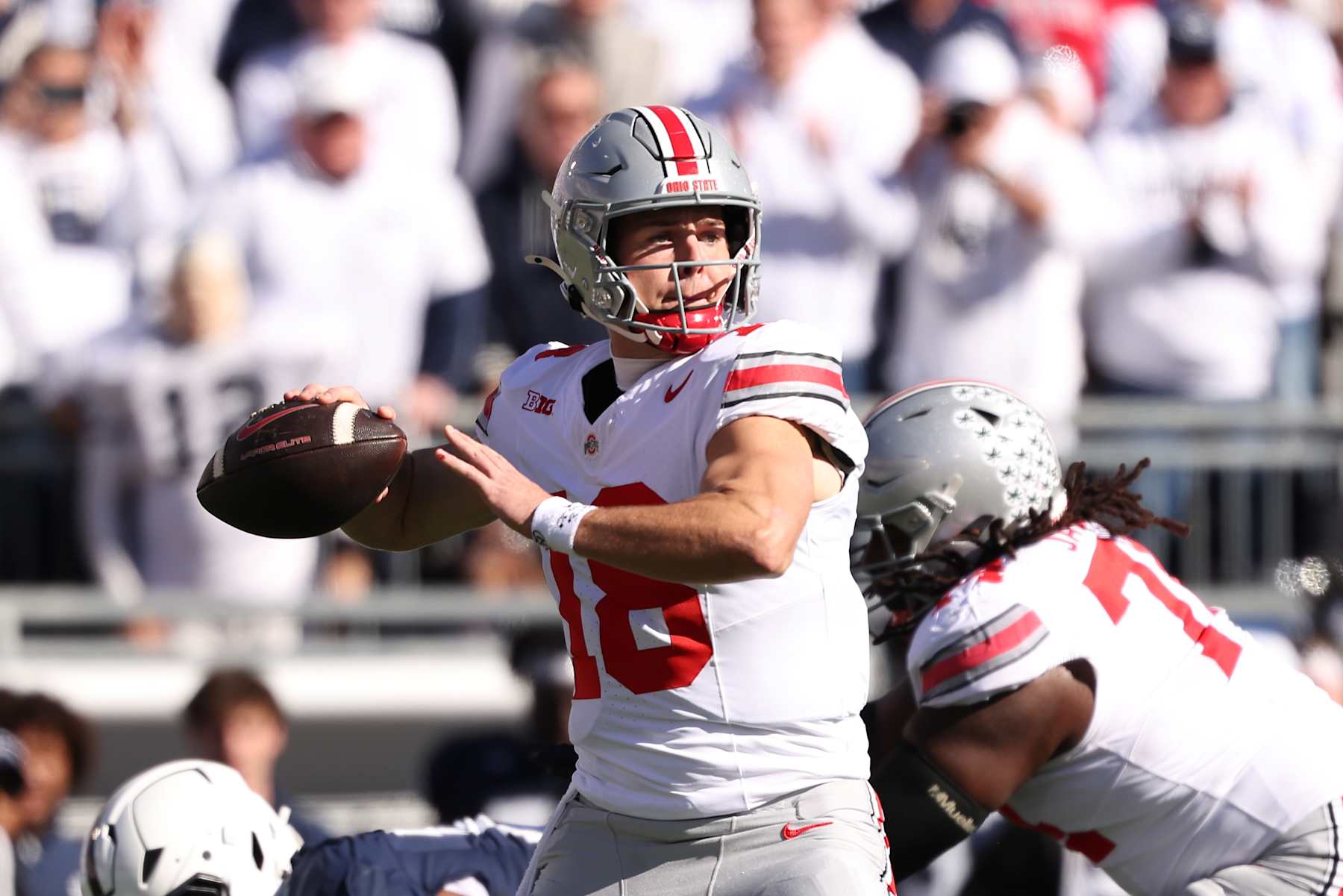 STATE COLLEGE, PENNSYLVANIA - NOVEMBER 02: Will Howard #18 of the Ohio State Buckeyes throws the ball during the first quarter against the Penn State Nittany Lions at Beaver Stadium on November 02, 2024 in State College, Pennsylvania. (Photo by Scott Taetsch/Getty Images)