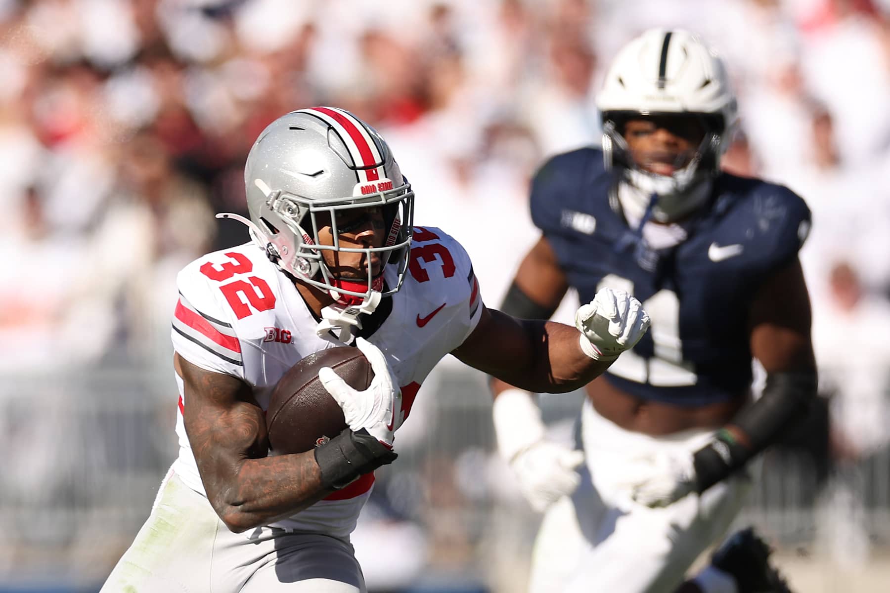 STATE COLLEGE, PENNSYLVANIA - NOVEMBER 02: TreVeyon Henderson #32 of the Ohio State Buckeyes runs the ball during the third quarter against the Penn State Nittany Lions at Beaver Stadium on November 02, 2024 in State College, Pennsylvania. Ohio State defeated Penn State 20-13 (Photo by Scott Taetsch/Getty Images)