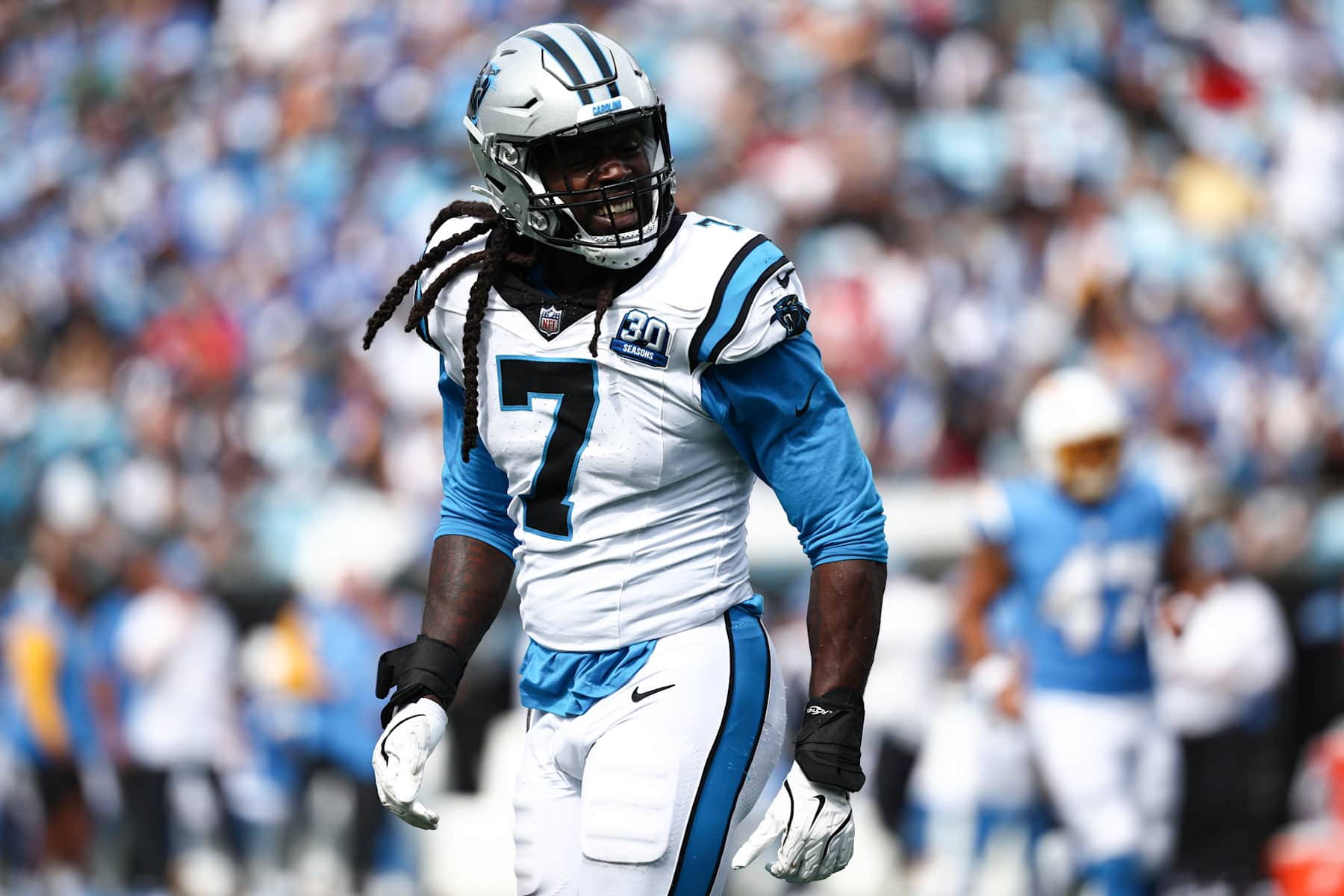 CHARLOTTE, NORTH CAROLINA - SEPTEMBER 15: Jadeveon Clowney #7 of the Carolina Panthers reacts after a fourth quarter hit against the Los Angeles Chargers at Bank of America Stadium on September 15, 2024 in Charlotte, North Carolina. (Photo by Jared C. Tilton/Getty Images)