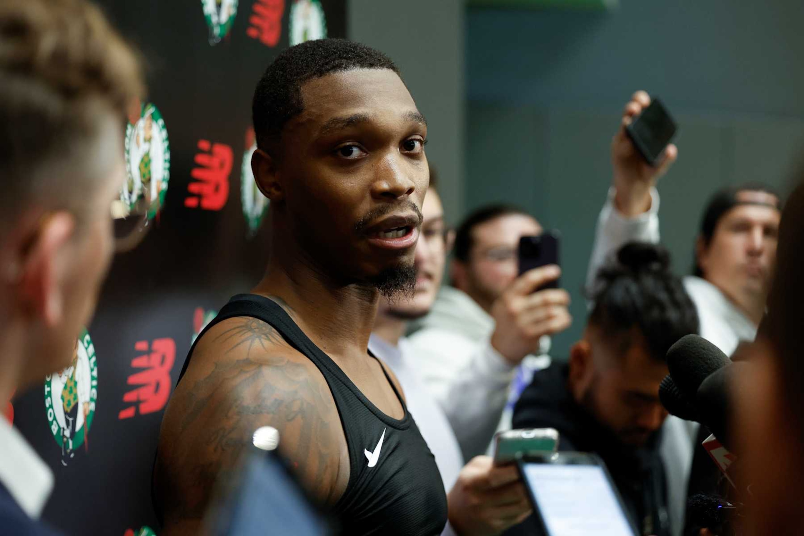 Boston, MA - September 25: Boston Celtics SG Lonnie Walker IV talks to reporters during the first day of Celtics training camp at the Auerbach Center. (Photo by Danielle Parhizkaran/The Boston Globe via Getty Images)