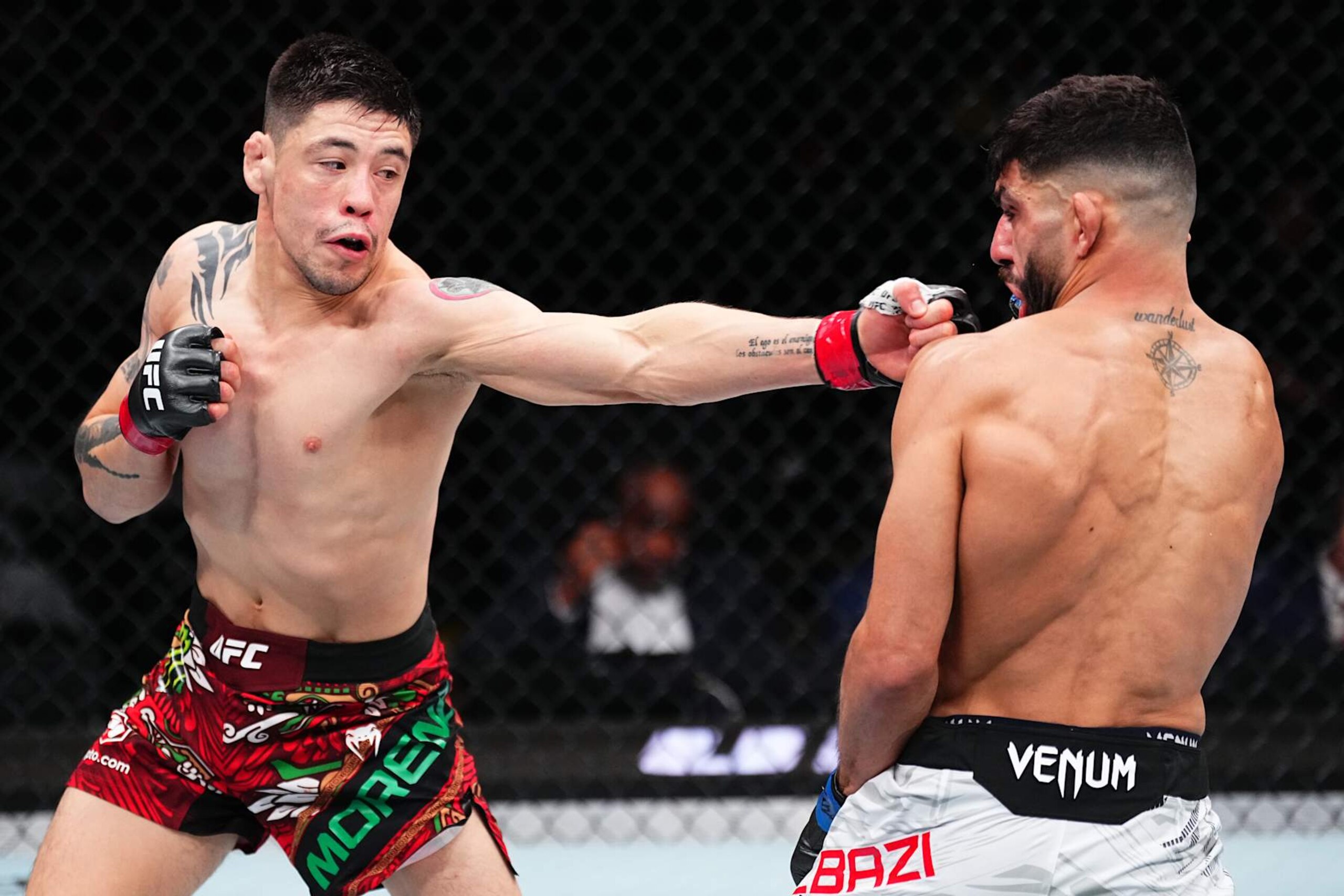 Brandon Moreno punches Amir Albazi Brandon Moreno punches Amir Albazi