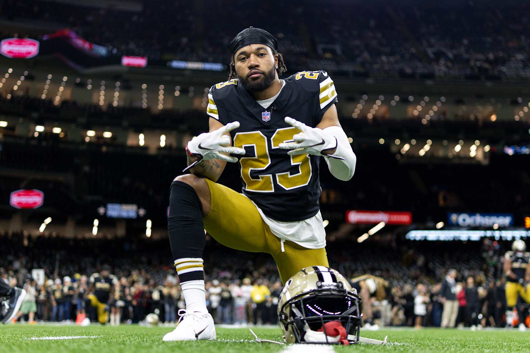 NEW ORLEANS, LOUSIANA - OCTOBER 17: Marshon Lattimore #23 of the New Orleans reacts as he poses for a picture as he stretches prior to an NFL Football game against the Denver Broncos at Caesars Superdome on October 17, 2024 in New Orleans, Lousiana. (Photo by Michael Owens/Getty Images)