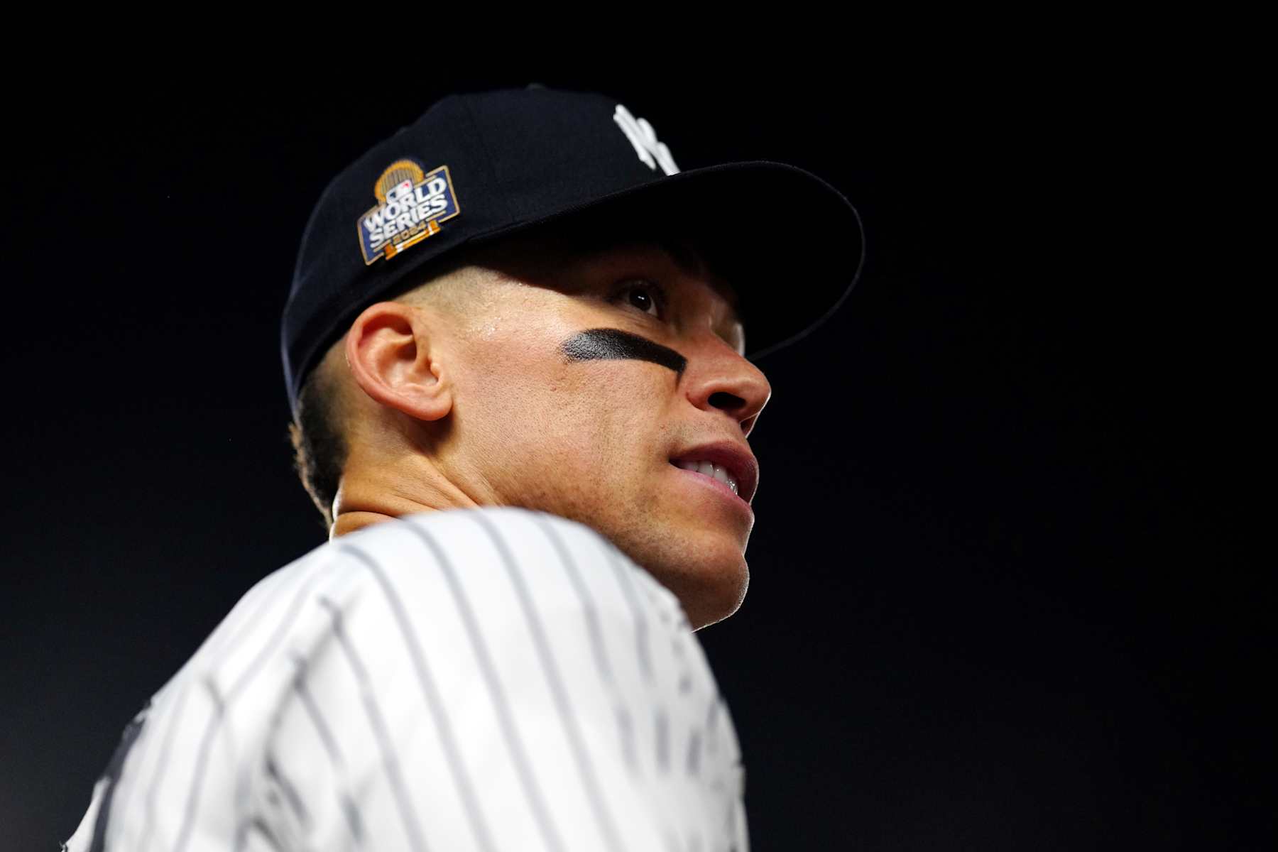 NEW YORK, NY - OCTOBER 30:  Aaron Judge #99 of the New York Yankees looks on during Game 5 of the 2024 World Series presented by Capital One between the Los Angeles Dodgers and the New York Yankees at Yankee Stadium on Wednesday, October 30, 2024 in New York, New York. (Photo by Mary DeCicco/MLB Photos via Getty Images)