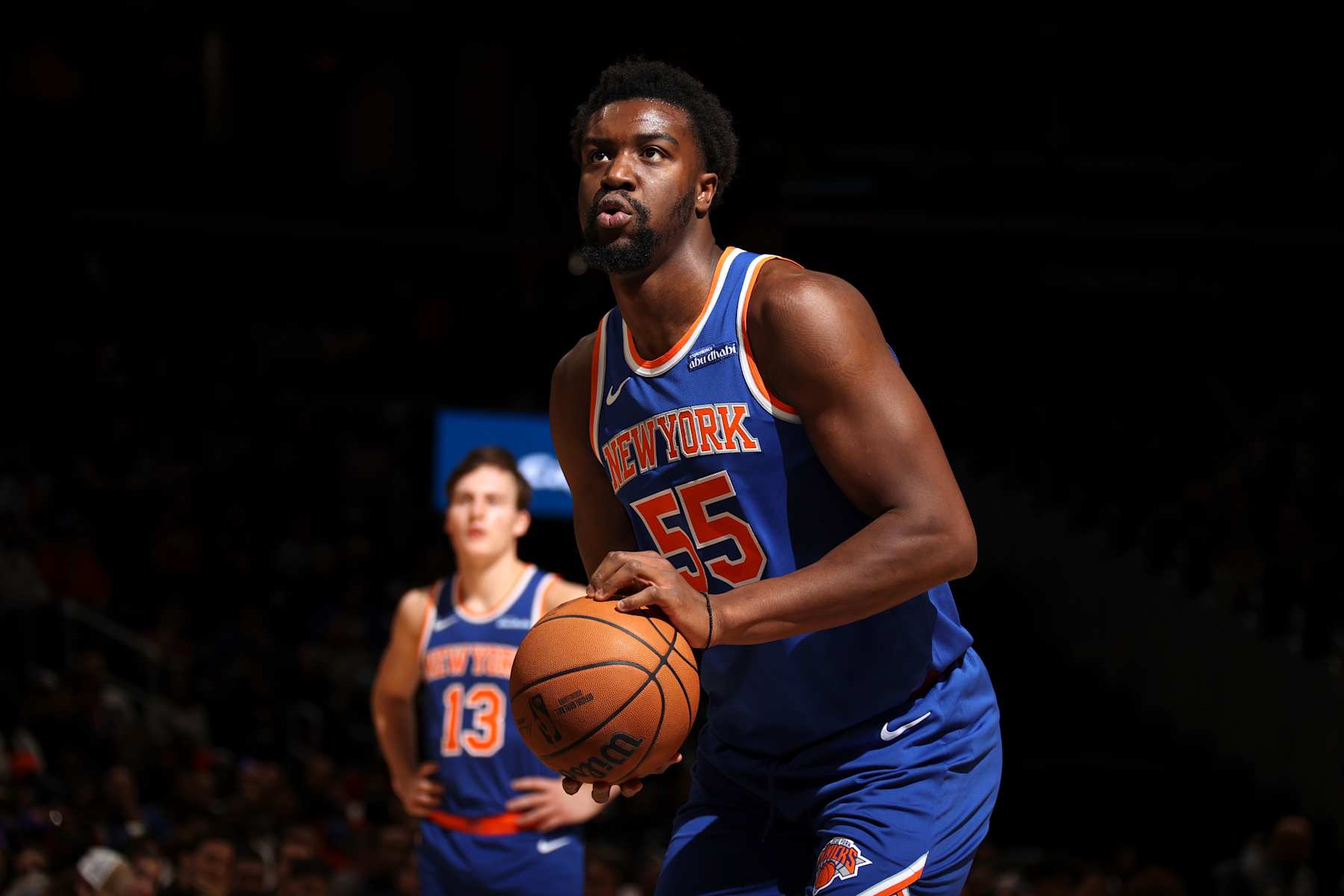 WASHINGTON, DC -  OCTOBER 18: Ariel Hukporti #55 of the New York Knicks prepares to shoot a free throw during the game against the Washington Wizards on October 18, 2024 at Capital One Arena in Washington, DC. NOTE TO USER: User expressly acknowledges and agrees that, by downloading and or using this Photograph, user is consenting to the terms and conditions of the Getty Images License Agreement. Mandatory Copyright Notice: Copyright 2024 NBAE (Photo by Stephen Gosling/NBAE via Getty Images)
