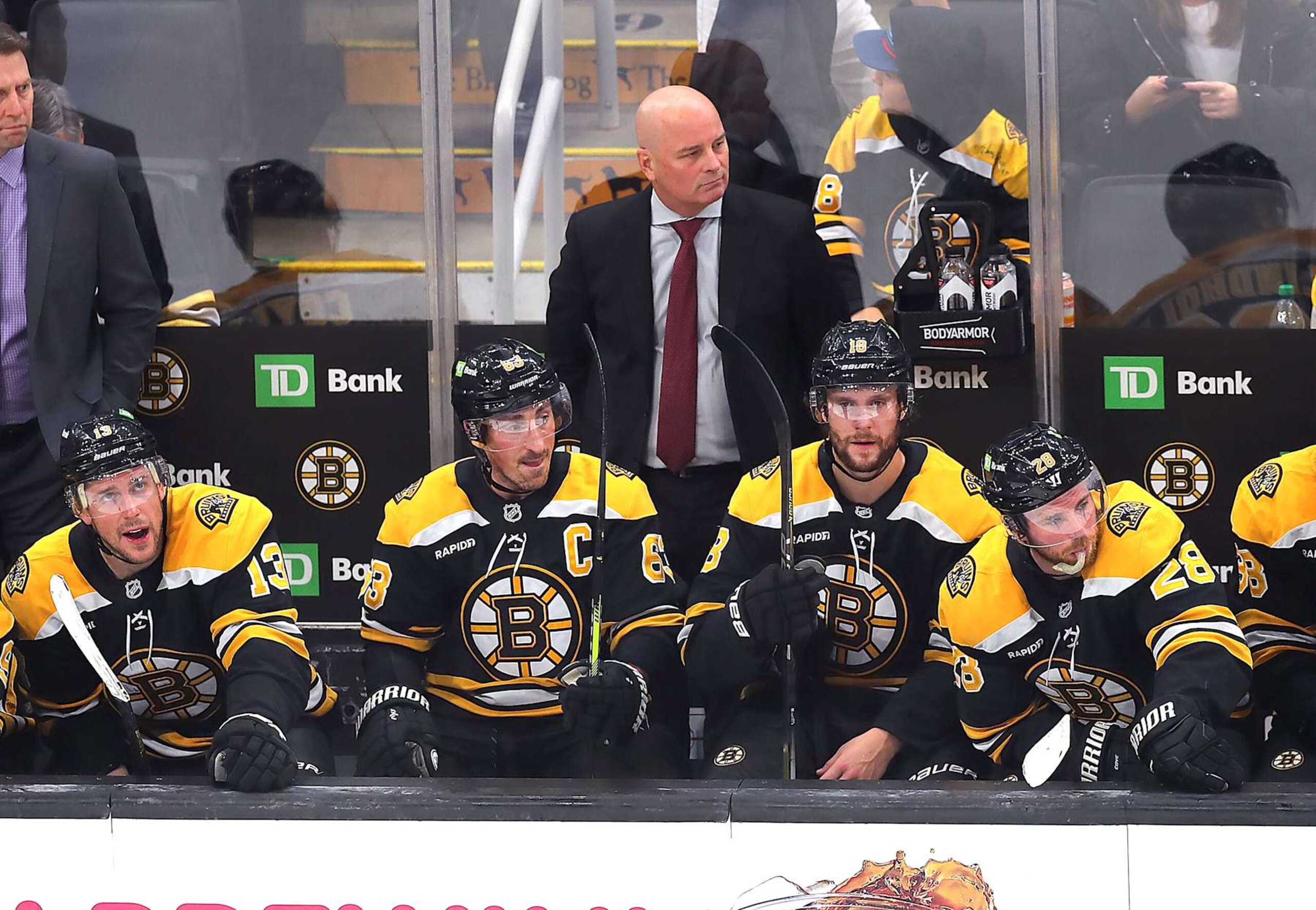 Boston, MA - October 24: Boston Bruins head coach Jim Montgomery watches the action from the bench. (Photo by John Tlumacki/The Boston Globe via Getty Images) Boston, MA - October 24: Boston Bruins head coach Jim Montgomery watches the action from the bench. (Photo by John Tlumacki/The Boston Globe via Getty Images)