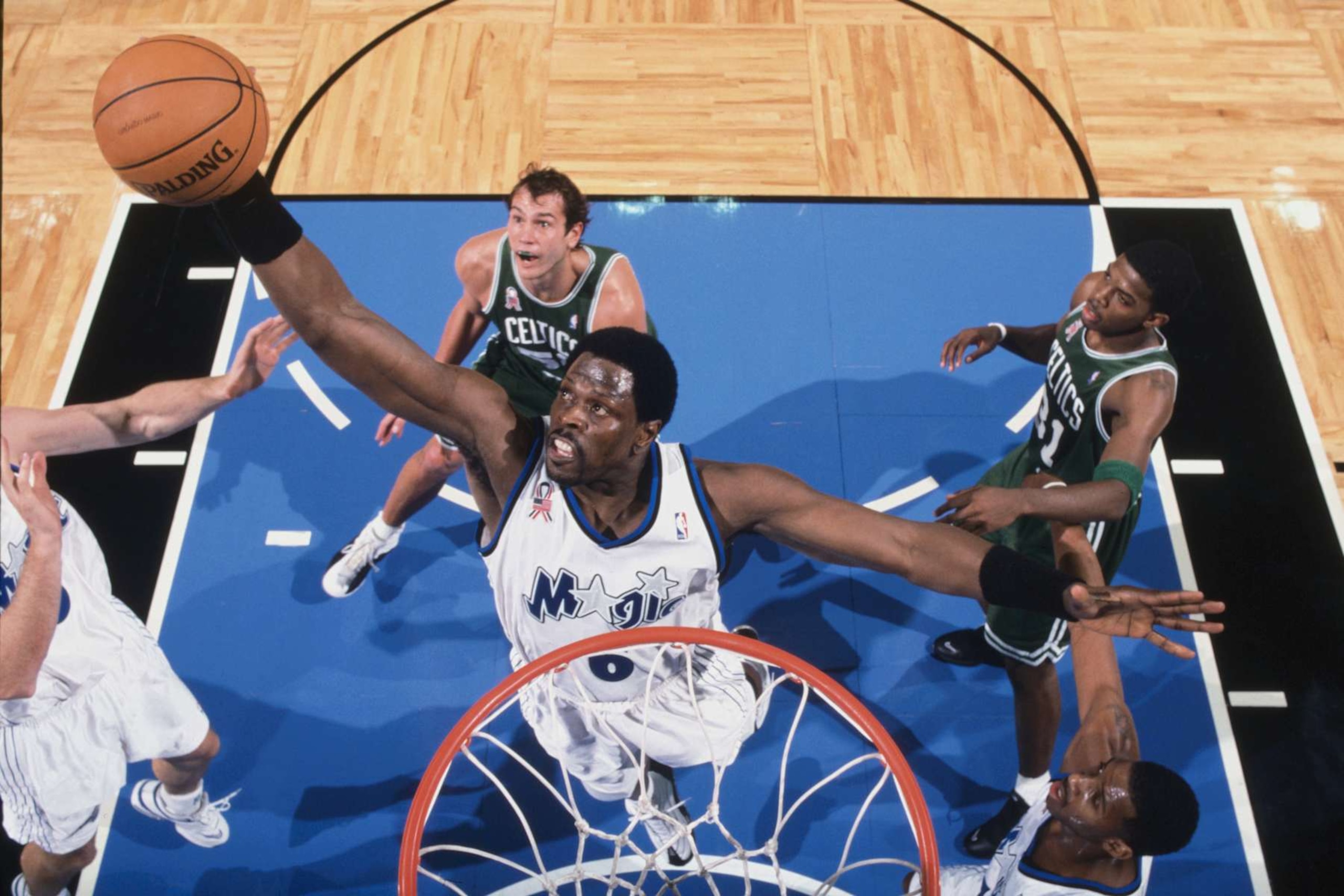 29 Nov 2001: Center Patrick Ewing #6 of the Orlando Magic grabs a rebound during the NBA game against the Boston Celtics at TD Waterhouse Centre in Orlando, Florida. The Celtics defeated the Magic 99-89. NOTE TO USER: User expressly acknowledges and agrees that, by downloading and/or using this Photograph, User is consenting to the terms and conditions of the Getty Images License Agreement. Mandatory copyright notice: Copyright 2001 NBAE Mandatory Credit: Fernando Medina /NBAE/Getty Images 29 Nov 2001: Center Patrick Ewing #6 of the Orlando Magic grabs a rebound during the NBA game against the Boston Celtics at TD Waterhouse Centre in Orlando, Florida. The Celtics defeated the Magic 99-89. NOTE TO USER: User expressly acknowledges and agrees that, by downloading and/or using this Photograph, User is consenting to the terms and conditions of the Getty Images License Agreement. Mandatory copyright notice: Copyright 2001 NBAE Mandatory Credit: Fernando Medina /NBAE/Getty Images