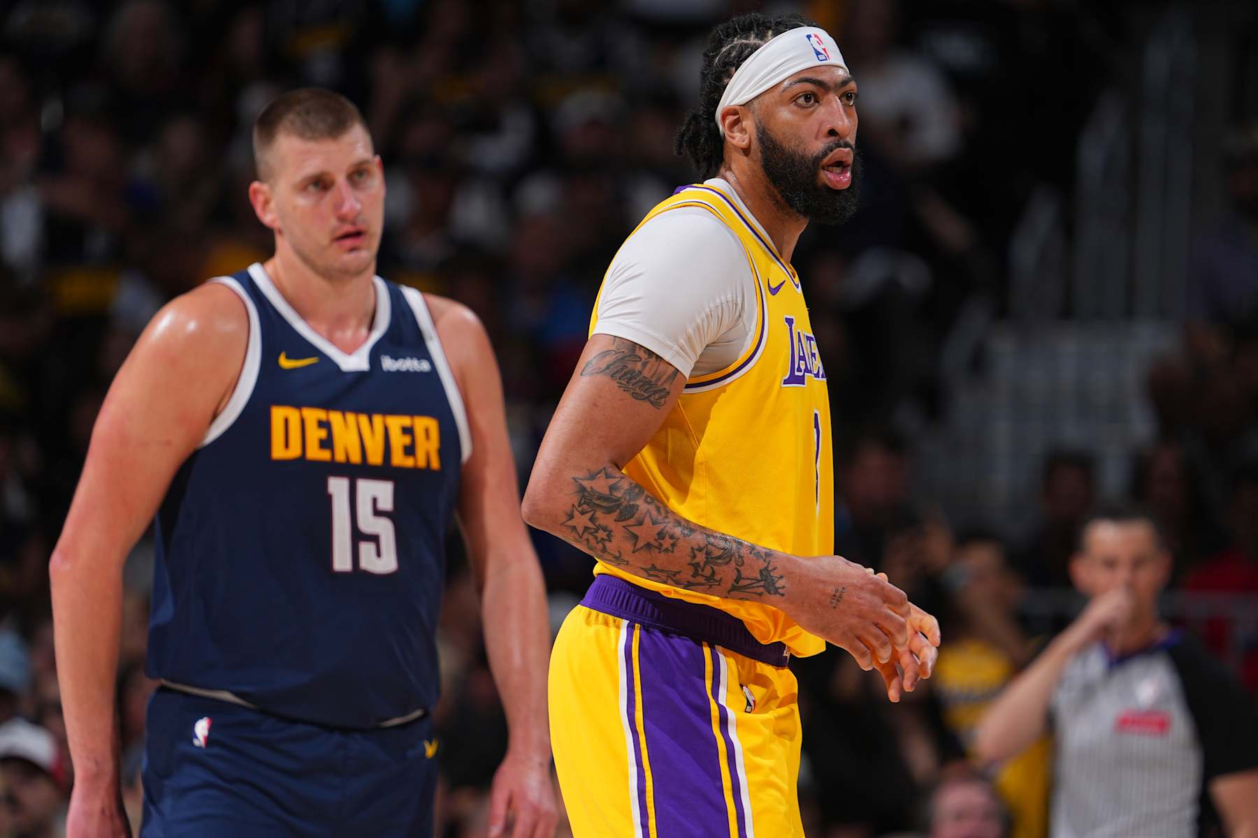 DENVER, CO - APRIL 29: Anthony Davis #3 of the Los Angeles Lakers and Nikola Jokic #15 of the Denver Nuggets look on during the game during Round One Game Five of the 2024 NBA Playoffs on April 29, 2024 at the Ball Arena in Denver, Colorado. NOTE TO USER: User expressly acknowledges and agrees that, by downloading and/or using this Photograph, user is consenting to the terms and conditions of the Getty Images License Agreement. Mandatory Copyright Notice: Copyright 2024 NBAE (Photo by Bart Young/NBAE via Getty Images)
