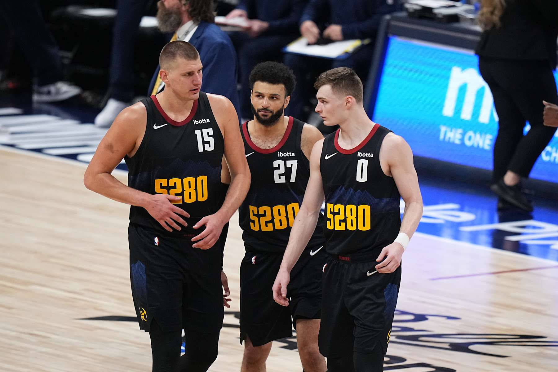 DENVER, CO - MAY 14: Nikola Jokic #15, Jamal Murray #27, and Christian Braun #0 of the Denver Nuggets talk against the Minnesota Timberwolves during Round 2 Game 5 of the 2024 NBA Playoffs on May 14, 2024 at the Ball Arena in Denver, Colorado. NOTE TO USER: User expressly acknowledges and agrees that, by downloading and/or using this Photograph, user is consenting to the terms and conditions of the Getty Images License Agreement. Mandatory Copyright Notice: Copyright 2024 NBAE (Photo by Bart Young/NBAE via Getty Images)