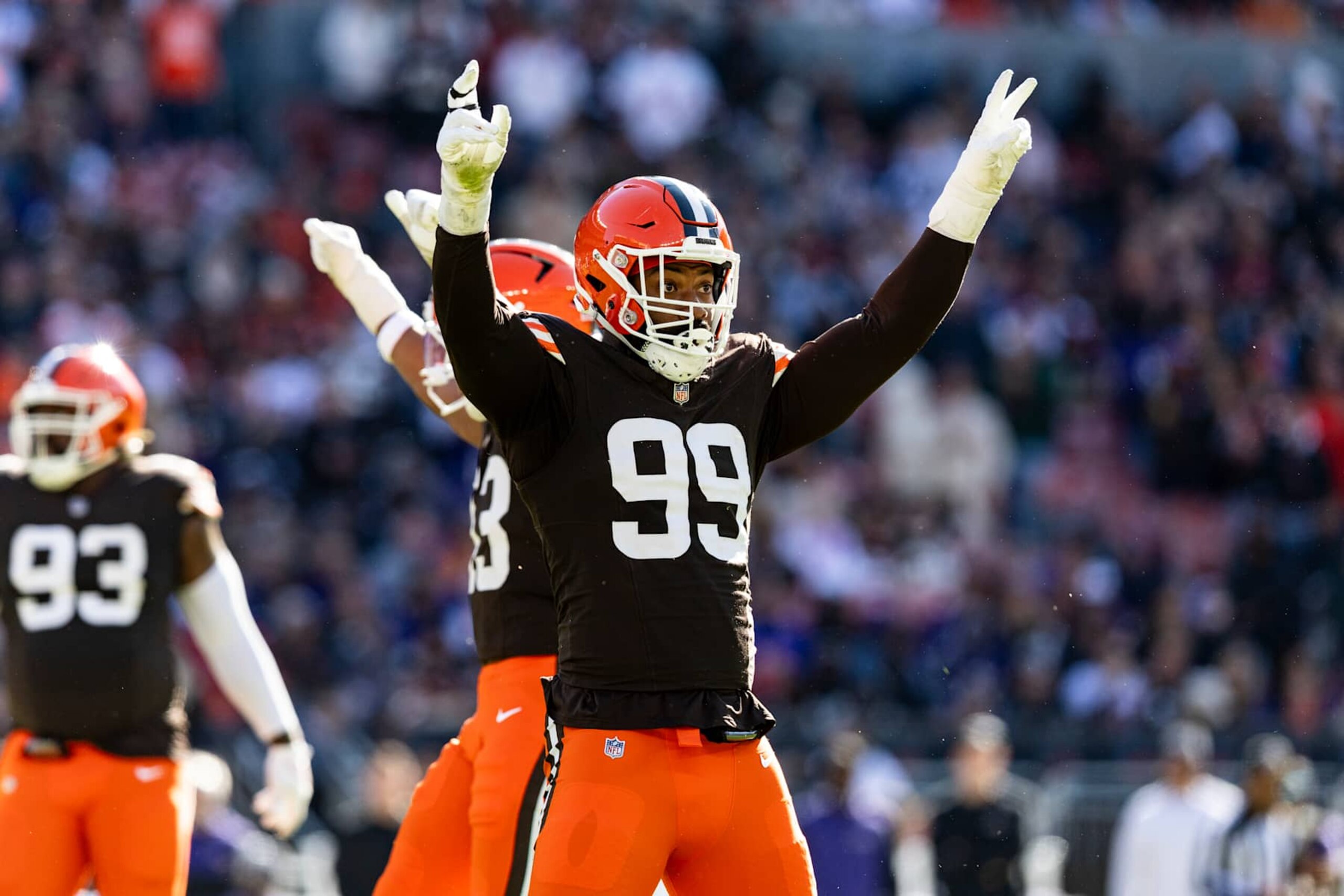 CLEVELAND, OHIO - OCTOBER 27: Za'Darius Smith #99 of the Cleveland Browns celebrates after tackling Lamar Jackson #8 of the Baltimore Ravens during the third quarter of the game at Huntington Bank Field on October 27, 2024 in Cleveland, Ohio. The Browns beat the Ravens 29-24. (Photo by Lauren Leigh Bacho/Getty Images)