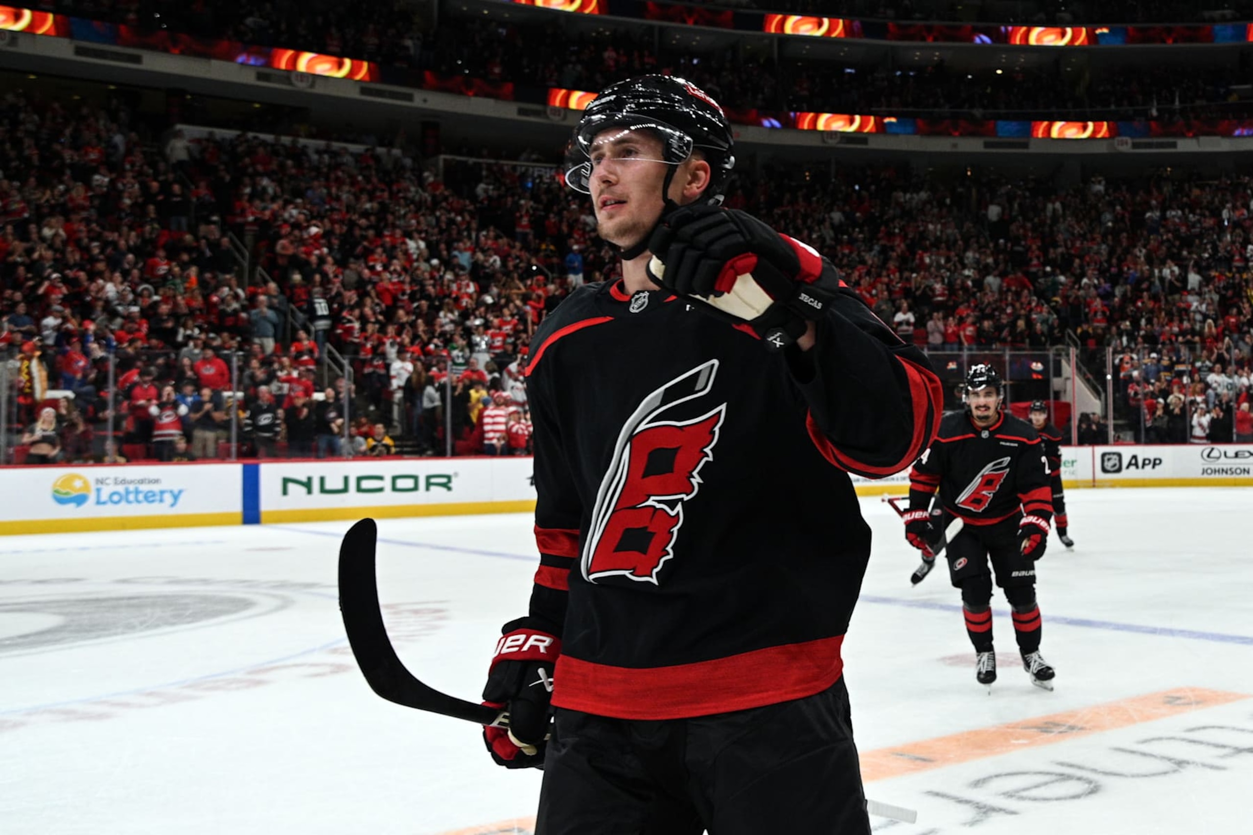 RALEIGH, NC - OCTOBER 31: Carolina Hurricanes Right Wing Martin Necas (88) fist bumps teammates after scoring during the NHL game between the Boston Bruins and the Carolina Hurricanes on October 31, 2024 at Lenovo Center in Raleigh, North Carolina. (Photo by Katherine Gawlik/Icon Sportswire via Getty Images)