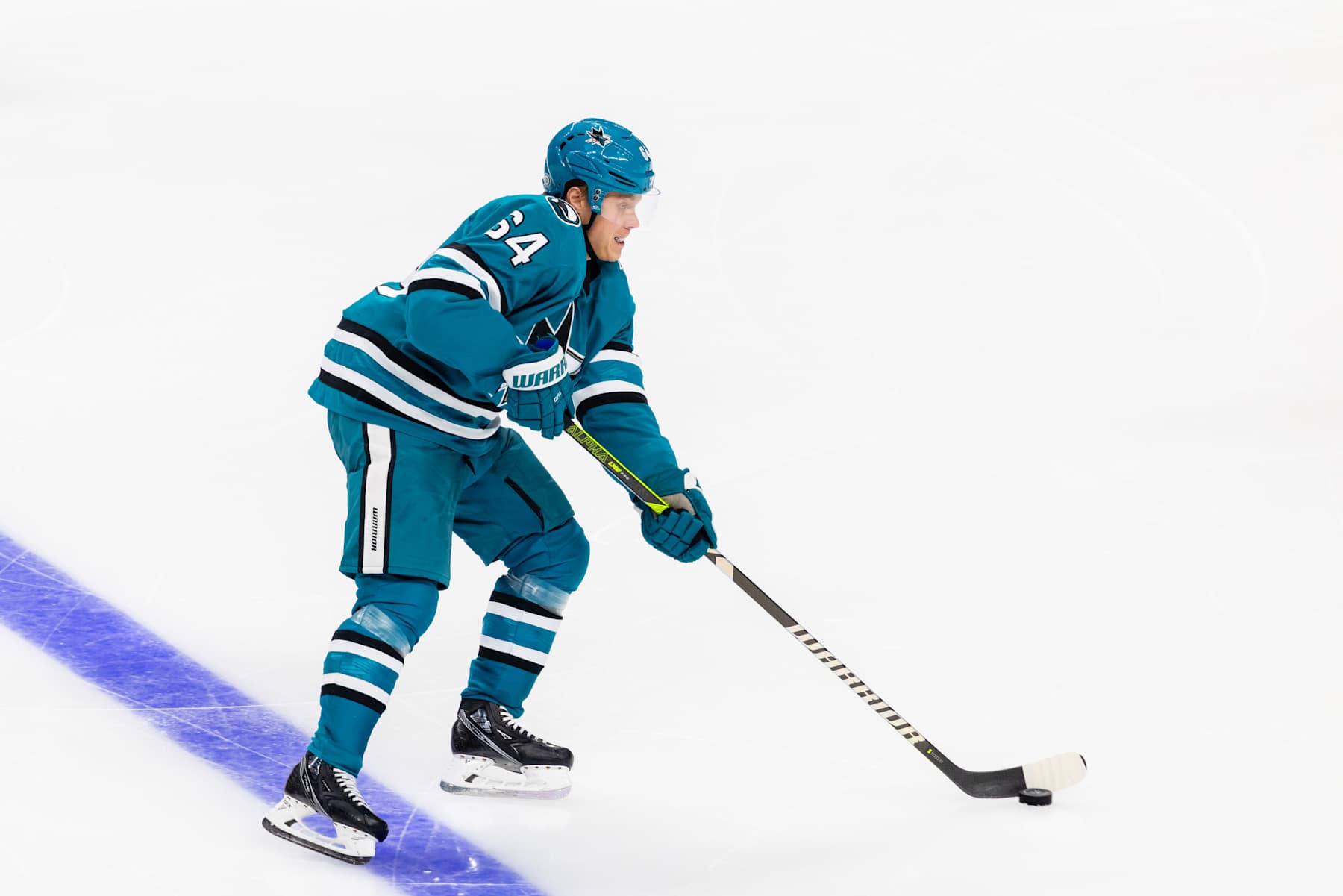 SAN JOSE, CA - NOVEMBER 02: San Jose Sharks center Mikael Granlund (64) looks to pass the puck during a NHL game between the Vancouver Canucks and the San Jose Sharks on November 2, 2024 at SAP Center at San Jose in San Jose, CA. (Photo by Matthew Huang/Icon Sportswire via Getty Images)
