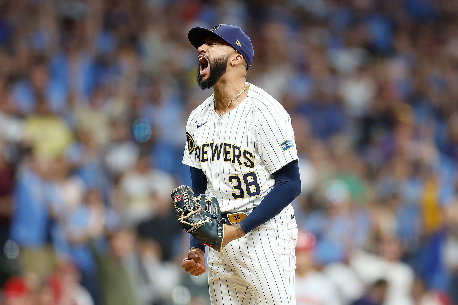 MILWAUKEE, WISCONSIN - AUGUST 10: Devin Williams #38 of the Milwaukee Brewers reacts after the third ou in the ninth inning against the Cincinnati Reds at American Family Field on August 10, 2024 in Milwaukee, Wisconsin. (Photo by John Fisher/Getty Images)