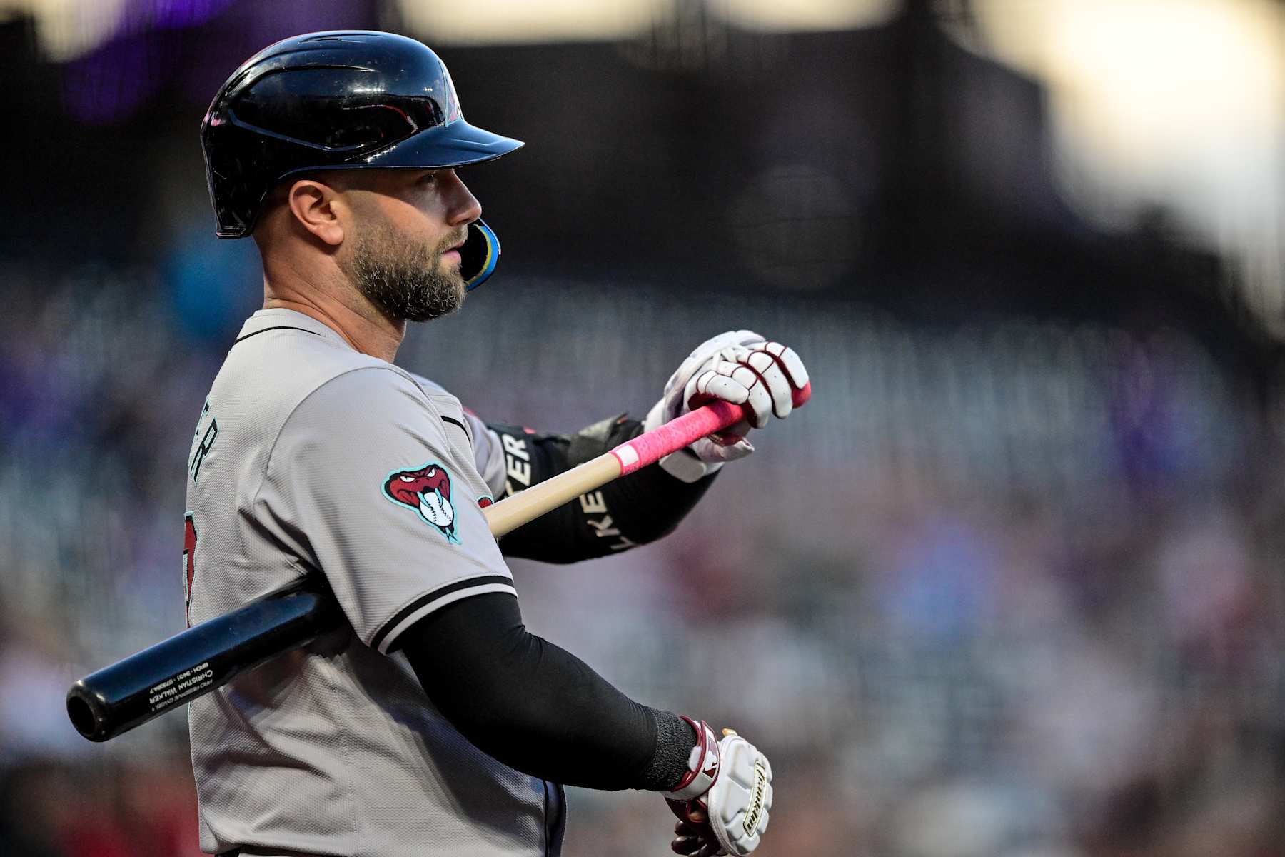 DENVER, COLORADO - SEPTEMBER 16: Christian Walker #53 of the Arizona Diamondbacks warms up before batting in the first inning against the Colorado Rockies at Coors Field on September 16, 2024 in Denver, Colorado. (Photo by Dustin Bradford/Getty Images)