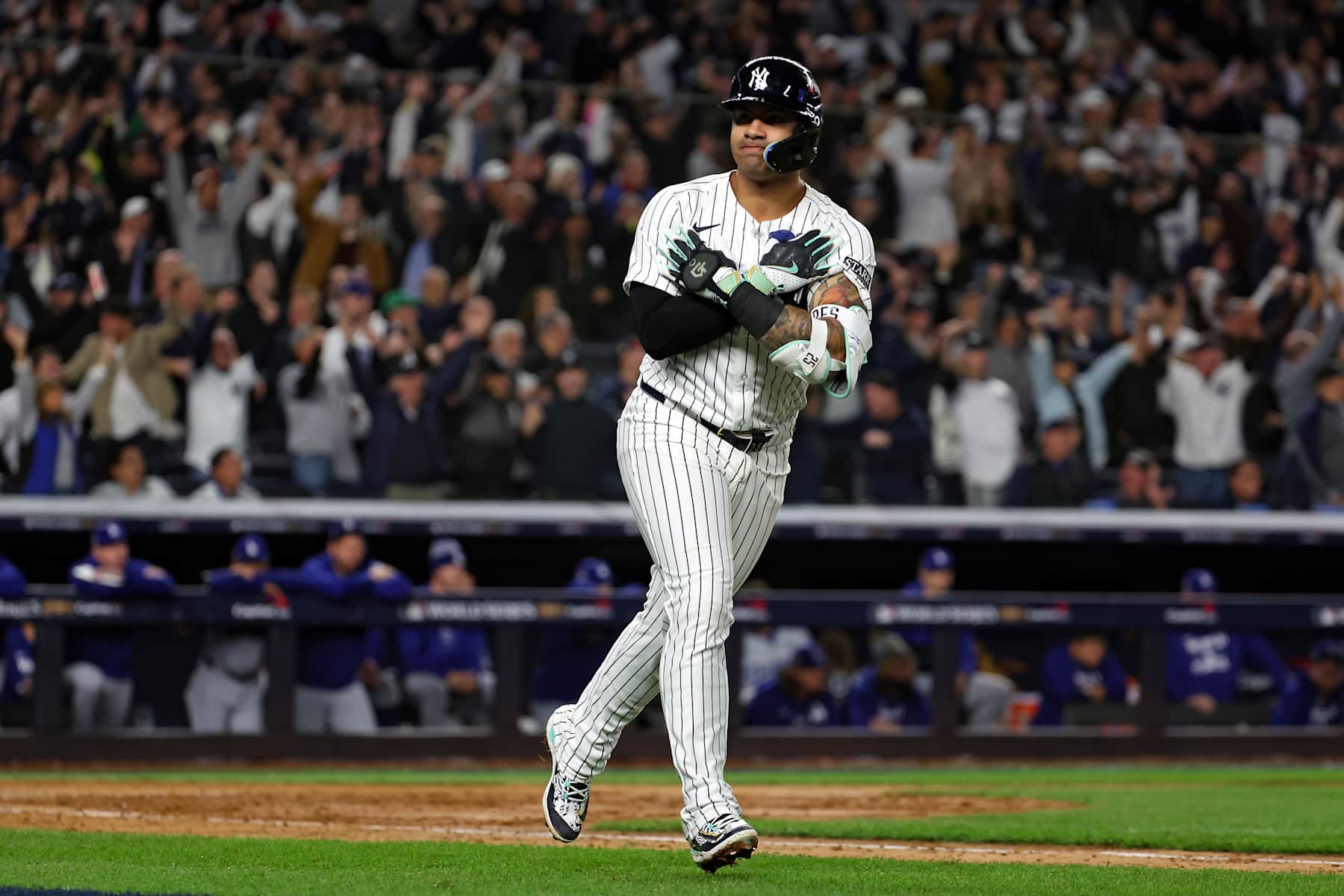 NEW YORK, NY - OCTOBER 29: Gleyber Torres #25 of the New York Yankees hits a home run during the World Series game against the Los Angeles Dodgers at Yankee Stadium on October 29, 2024, in New York, New York. (Photo by New York Yankees/Getty Images)