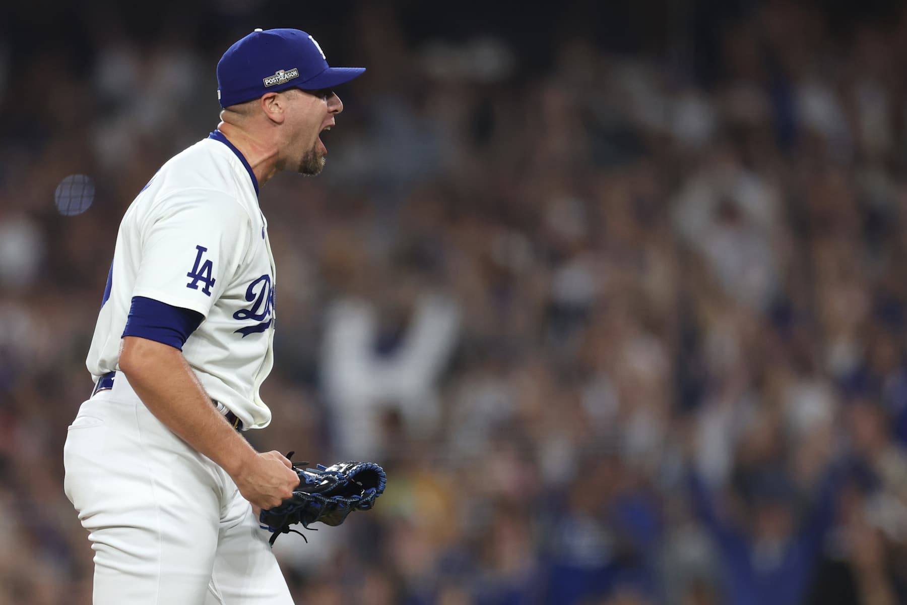 LOS ANGELES, CALIFORNIA - OCTOBER 11: Blake Treinen #49 of the Los Angeles Dodgers celebrates after the final out was recorded against the San Diego Padres in Game Five of the Division Series at Dodger Stadium on October 11, 2024 in Los Angeles, California.  (Photo by Harry How/Getty Images)