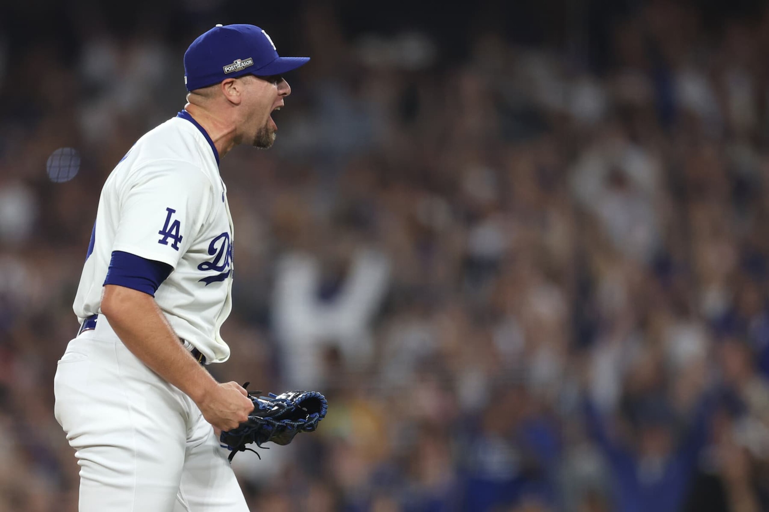 LOS ANGELES, CALIFORNIA - OCTOBER 11: Blake Treinen #49 of the Los Angeles Dodgers celebrates after the final out was recorded against the San Diego Padres in Game Five of the Division Series at Dodger Stadium on October 11, 2024 in Los Angeles, California.  (Photo by Harry How/Getty Images)