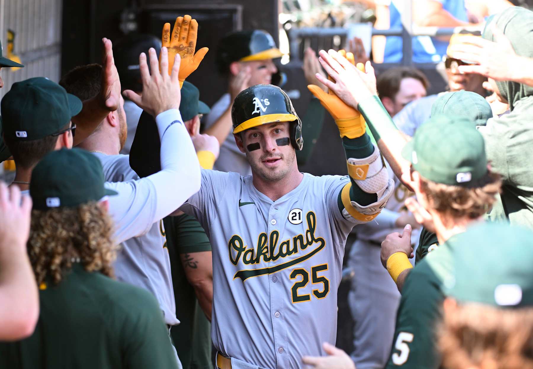 CHICAGO, ILLINOIS - SEPTEMBER 15: Brent Rooker #25 of the Oakland Athletics is congratulated by teammates following a two-run home run during the fifth inning of a game against the Chicago White Sox at Guaranteed Rate Field on September 15, 2024 in Chicago, Illinois. (Photo by Nuccio DiNuzzo/Getty Images)