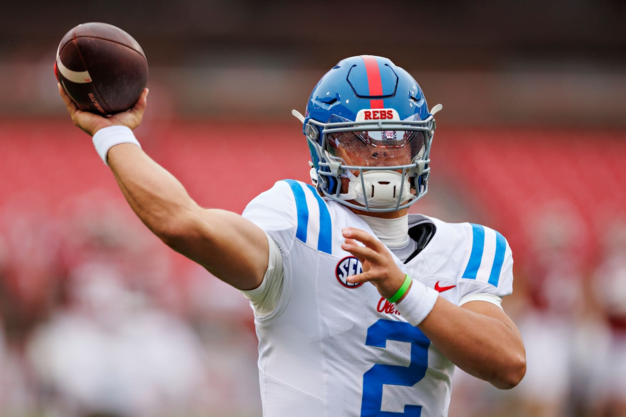 FAYETTEVILLE, ARKANSAS - NOVEMBER 02: Jaxson Dart #2 of the Ole Miss Rebels warms up before a game against the Arkansas Razorbacks at Donald W. Reynolds Razorback Stadium on November 02, 2024 in Fayetteville, Arkansas. (Photo by Wesley Hitt/Getty Images)