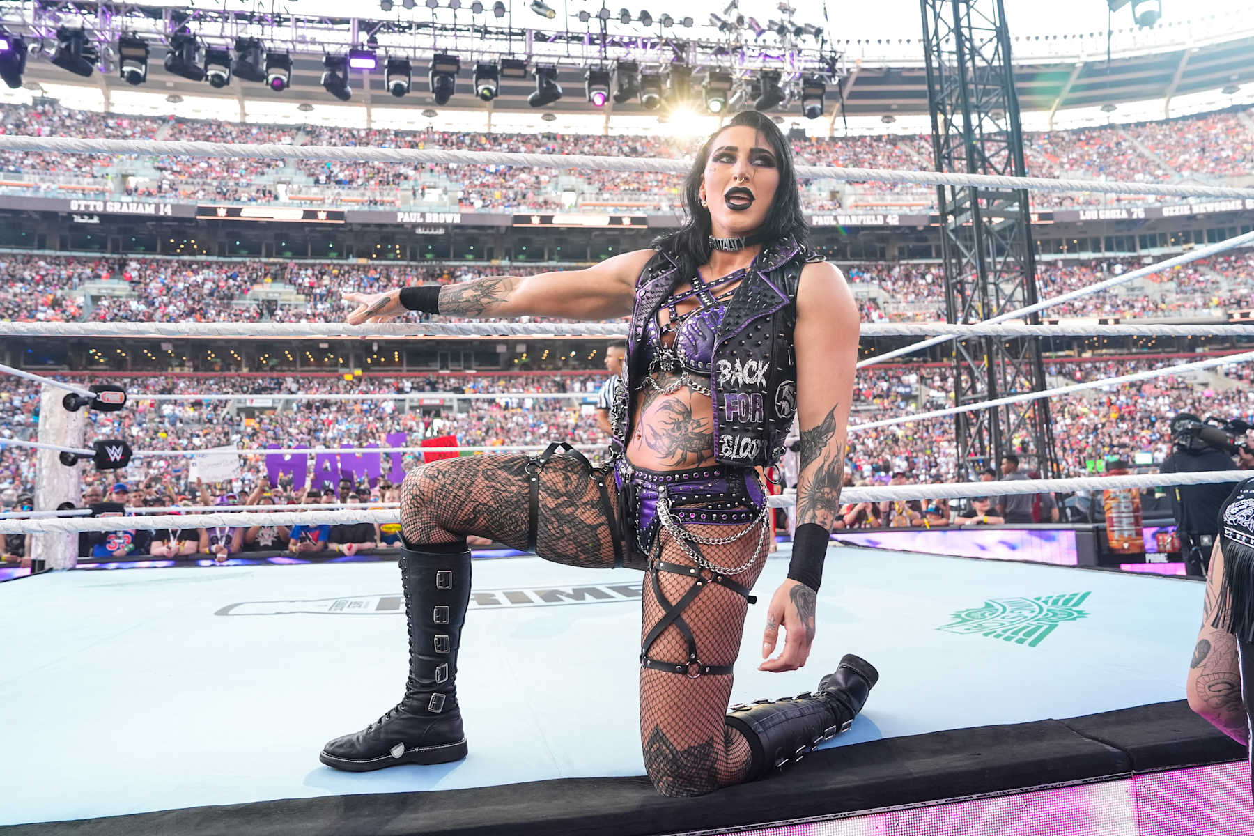 CLEVELAND, OHIO - AUGUST 3: Rhea Ripley makes her entrance during SummerSlam at Cleveland Browns Stadium on August 3, 2024 in Cleveland, Ohio.  (Photo by WWE/Getty Images)