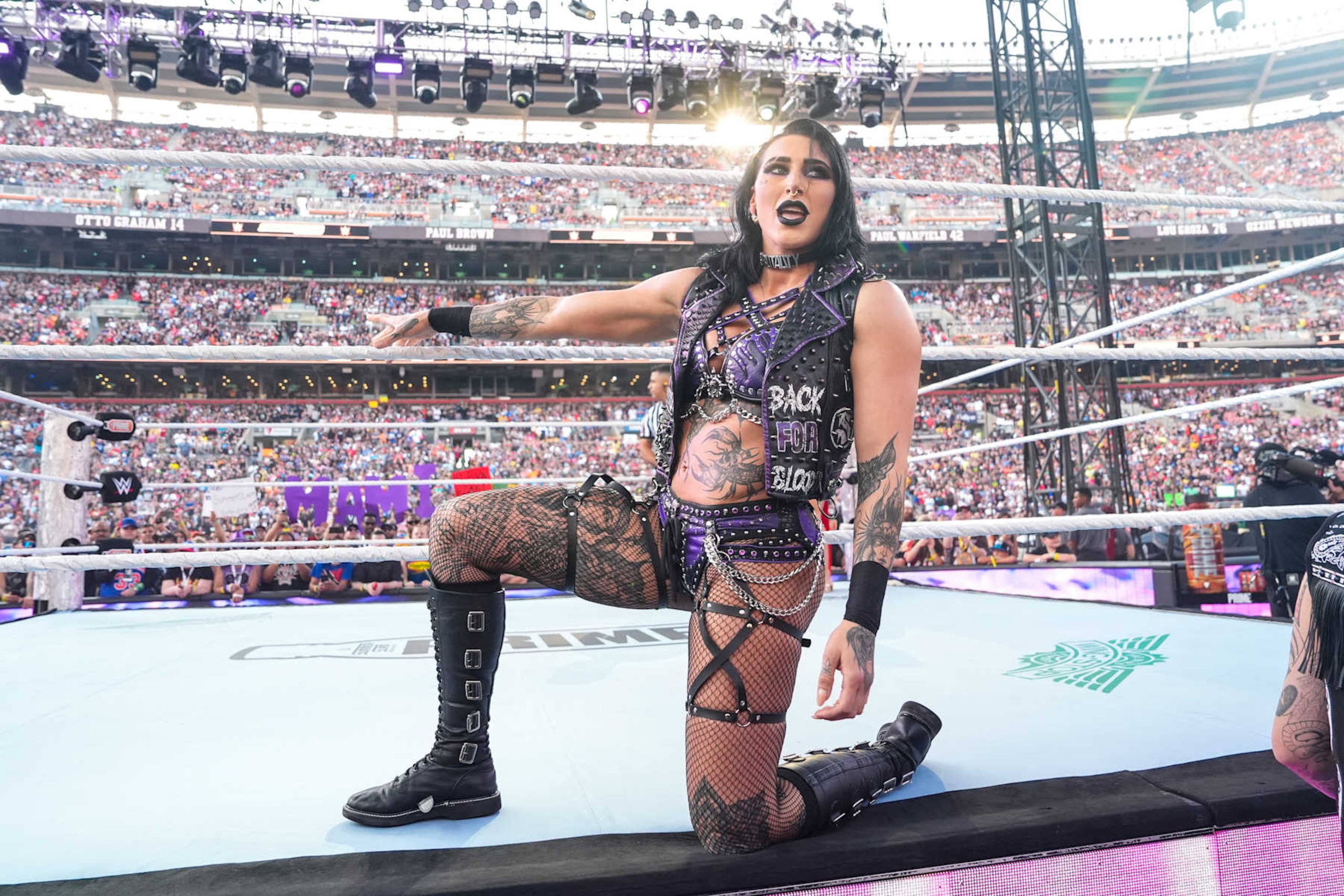 CLEVELAND, OHIO - AUGUST 3: Rhea Ripley makes her entrance during SummerSlam at Cleveland Browns Stadium on August 3, 2024 in Cleveland, Ohio.  (Photo by WWE/Getty Images)