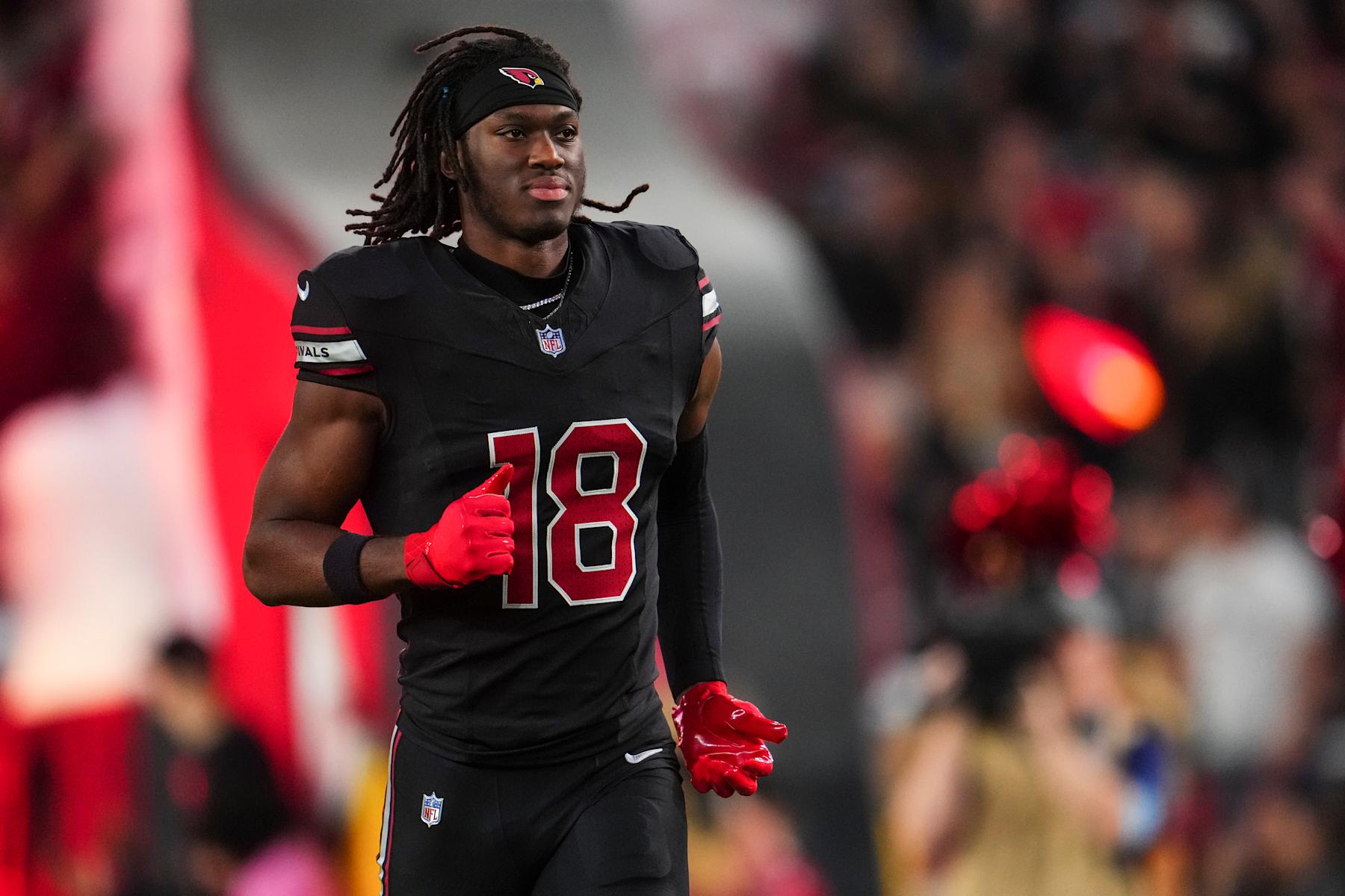 GLENDALE, AZ - OCTOBER 21: Marvin Harrison Jr. #18 of the Arizona Cardinals runs out of the tunnel prior to an NFL football game against the Los Angeles Chargers at State Farm Stadium on October 21, 2024 in Glendale, Arizona. (Photo by Cooper Neill/Getty Images)