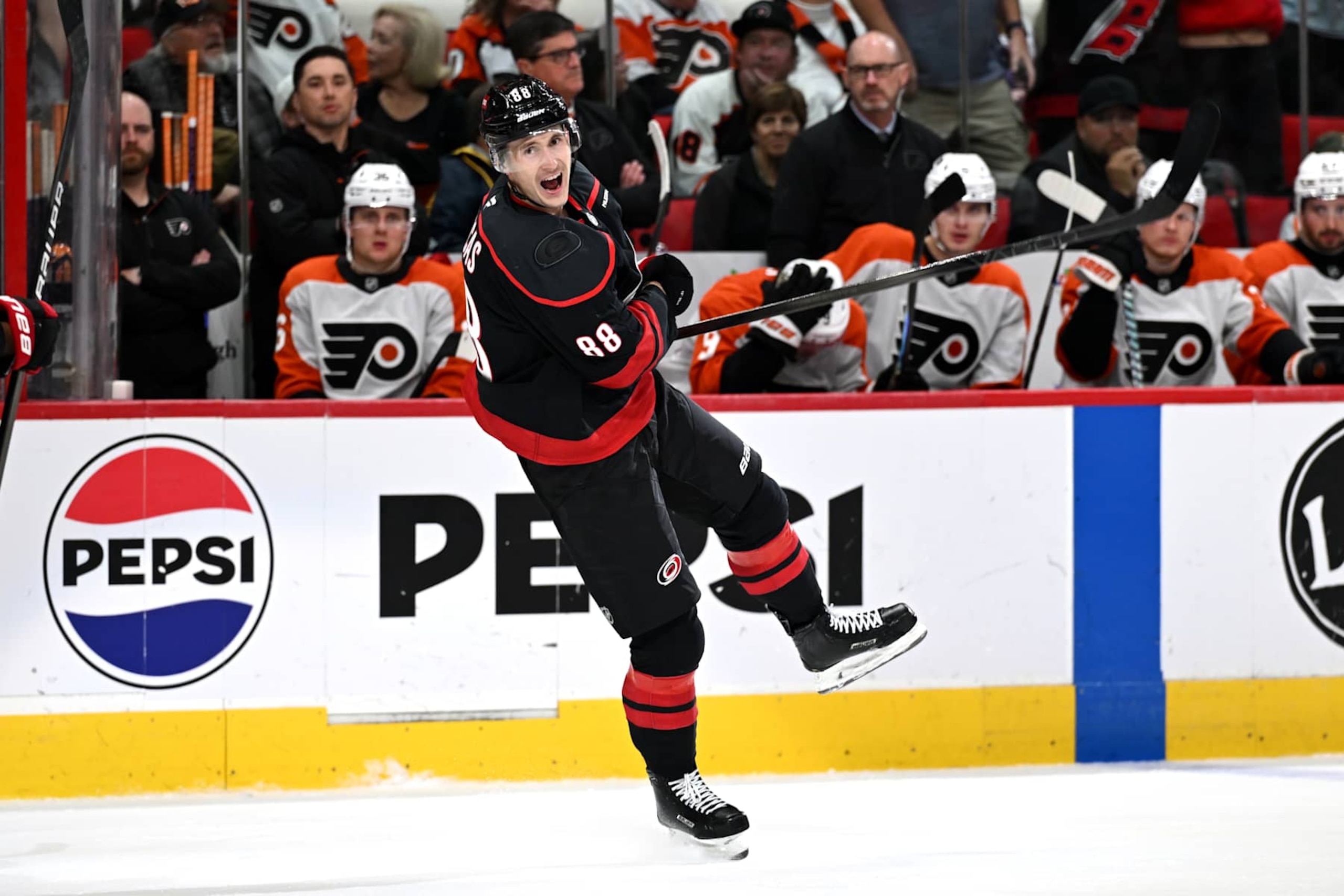 RALEIGH, NC - NOVEMBER 05: Carolina Hurricanes Right Wing Martin Necas (88) celebrates scoring during the NHL game between the Philadelphia Flyers and the Carolina Hurricanes on November 5, 2024 at Lenovo Center in Raleigh, North Carolina. (Photo by Katherine Gawlik/Icon Sportswire via Getty Images) RALEIGH, NC - NOVEMBER 05: Carolina Hurricanes Right Wing Martin Necas (88) celebrates scoring during the NHL game between the Philadelphia Flyers and the Carolina Hurricanes on November 5, 2024 at Lenovo Center in Raleigh, North Carolina. (Photo by Katherine Gawlik/Icon Sportswire via Getty Images)