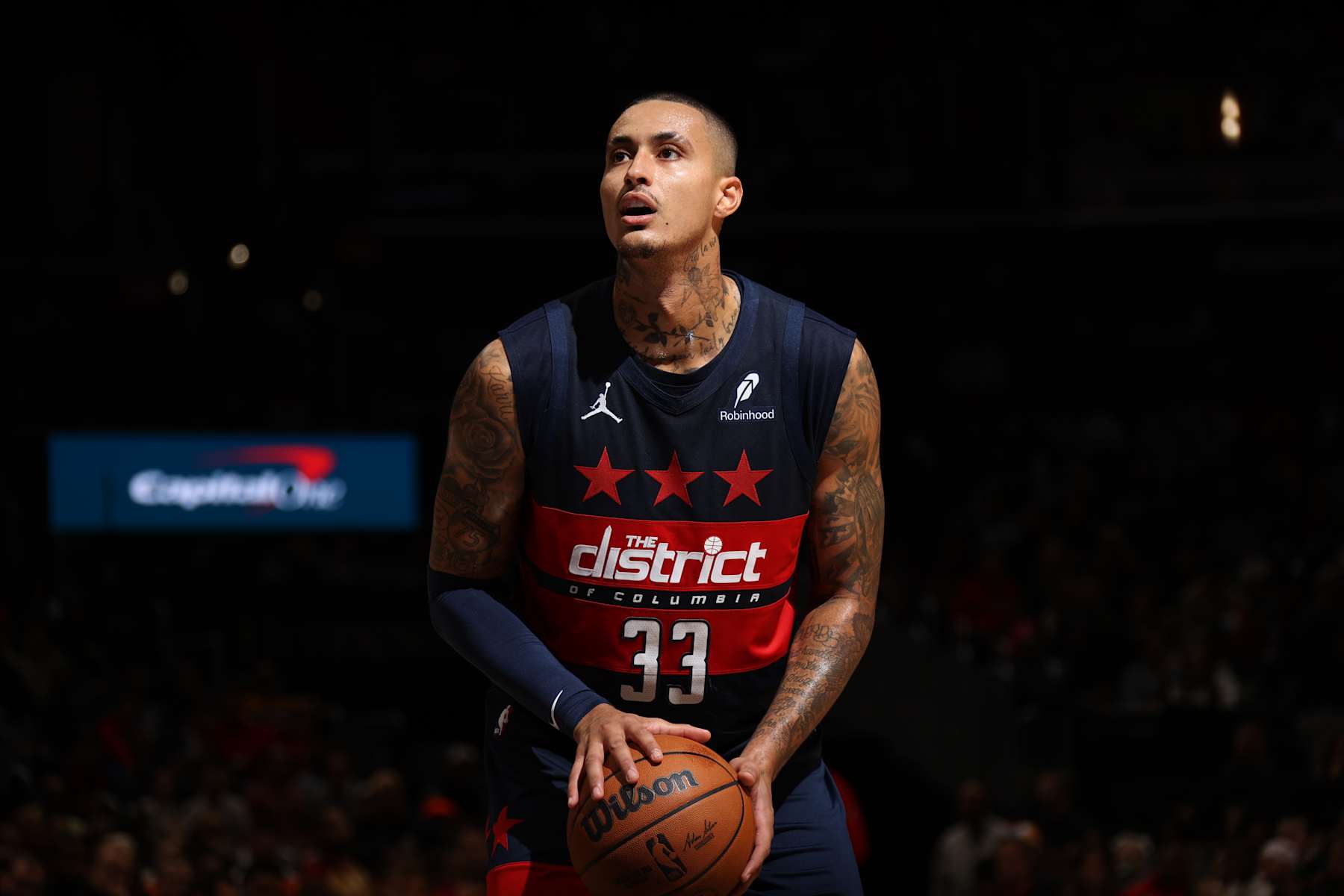 WASHINGTON, DC -  OCTOBER 26: Kyle Kuzma #33 of the Washington Wizards shoots a free throw during the game against the Cleveland Cavaliers on October 26, 2024 at Capital One Arena in Washington, DC. NOTE TO USER: User expressly acknowledges and agrees that, by downloading and or using this Photograph, user is consenting to the terms and conditions of the Getty Images License Agreement. Mandatory Copyright Notice: Copyright 2024 NBAE (Photo by Stephen Gosling/NBAE via Getty Images)