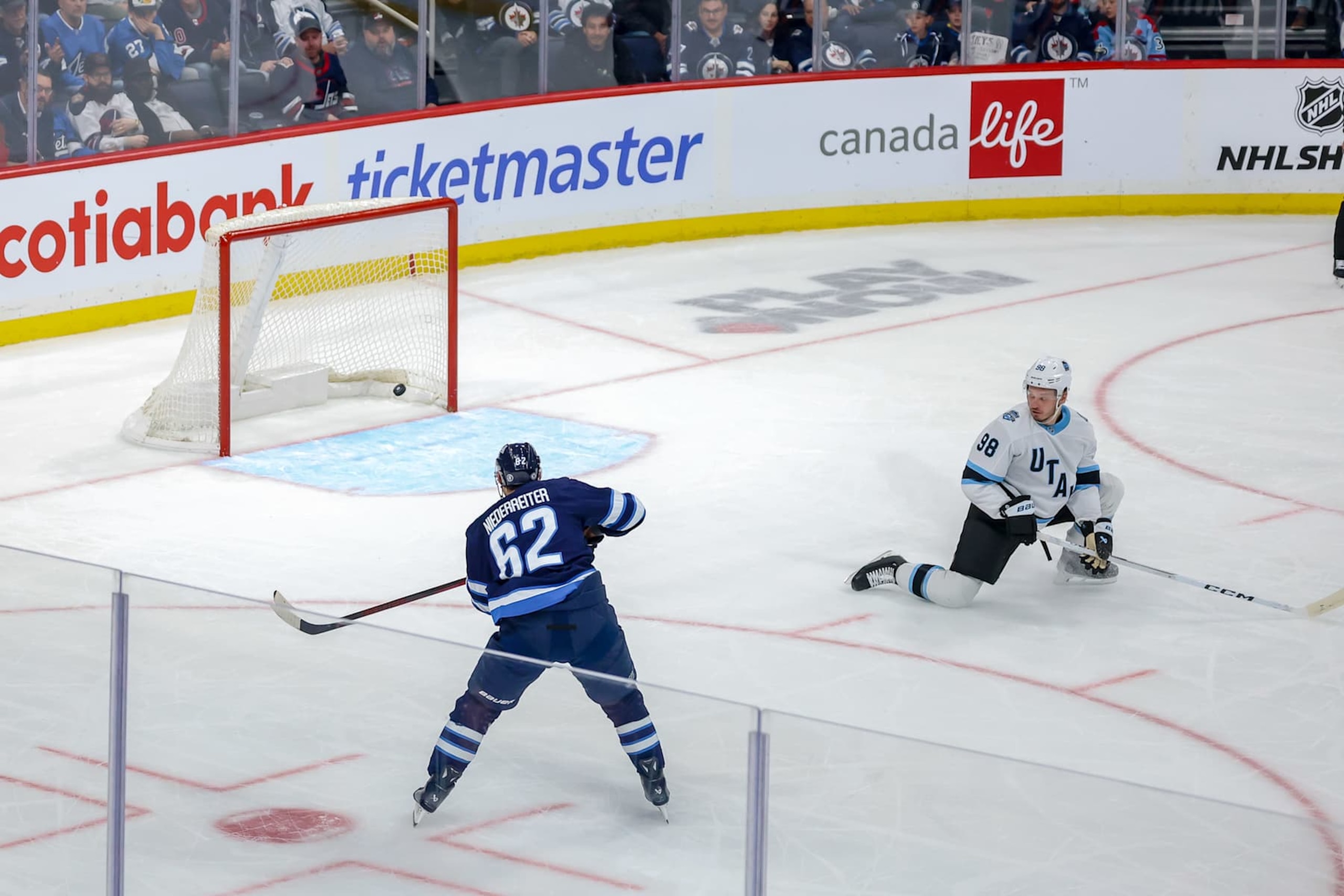 WINNIPEG, CANADA - NOVEMBER 5: Nino Niederreiter #62 of the Winnipeg Jets scores a third period empty net goal against the Utah Hockey Club at the Canada Life Centre on November 5, 2024 in Winnipeg, Manitoba, Canada. (Photo by Jonathan Kozub/NHLI via Getty Images) WINNIPEG, CANADA - NOVEMBER 5: Nino Niederreiter #62 of the Winnipeg Jets scores a third period empty net goal against the Utah Hockey Club at the Canada Life Centre on November 5, 2024 in Winnipeg, Manitoba, Canada. (Photo by Jonathan Kozub/NHLI via Getty Images)