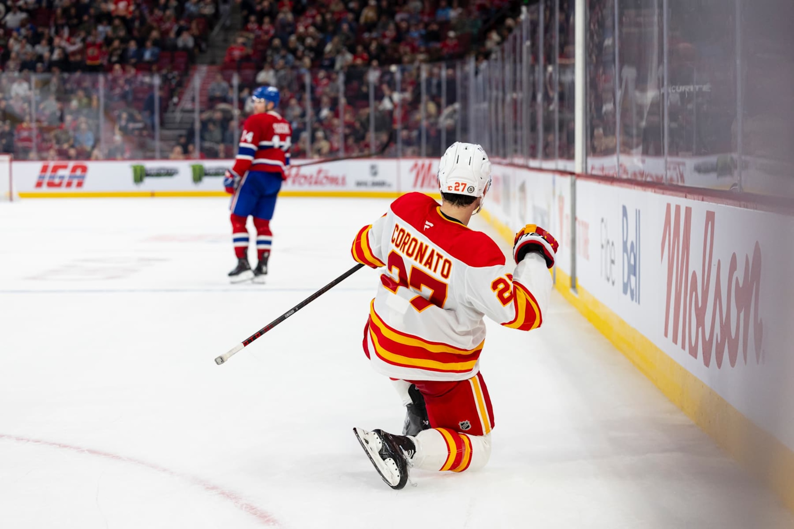 MONTREAL, CANADA- NOVEMBER 5: Matt Coronato #27 of the Calgary Flames celebrates the overtime winner during the overtime period of NHL regular season game between the Montreal Canadiens and the Calgary Flames at the Bell Centre on November 5, 2024 in Montreal, Quebec, Canada. (Photo by Vitor Munhoz/NHLI via Getty Images) MONTREAL, CANADA- NOVEMBER 5: Matt Coronato #27 of the Calgary Flames celebrates the overtime winner during the overtime period of NHL regular season game between the Montreal Canadiens and the Calgary Flames at the Bell Centre on November 5, 2024 in Montreal, Quebec, Canada. (Photo by Vitor Munhoz/NHLI via Getty Images)