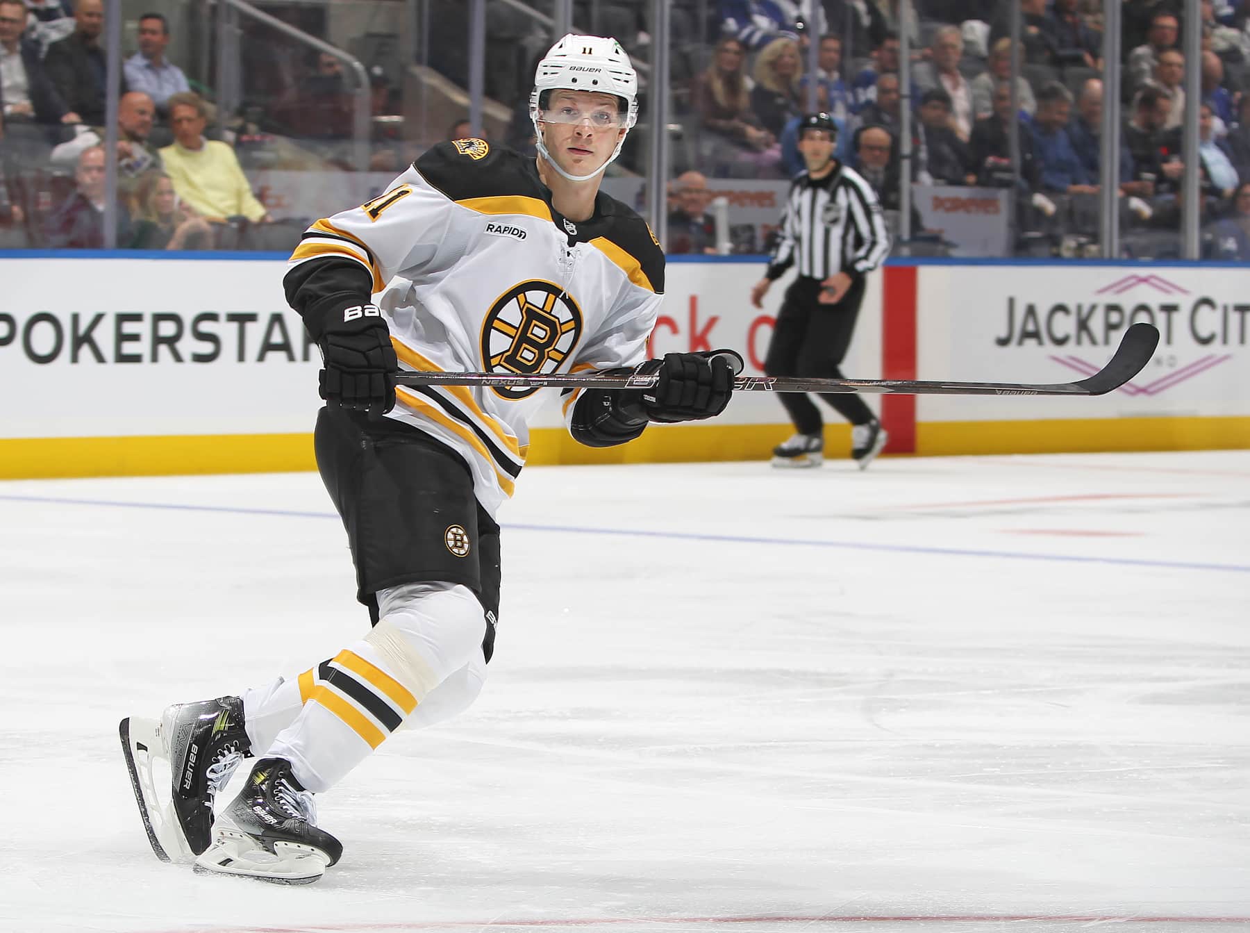 TORONTO, CANADA - NOVEMBER 5:  Trent Frederic #11 of the Boston Bruins skates against the Toronto Maple Leafs during the Second period in an NHL game at Scotiabank Arena on November 5, 2024 in Toronto, Ontario, Canada. The Maple Leafs defeated the Bruins 4-0. (Photo by Claus Andersen/Getty Images)