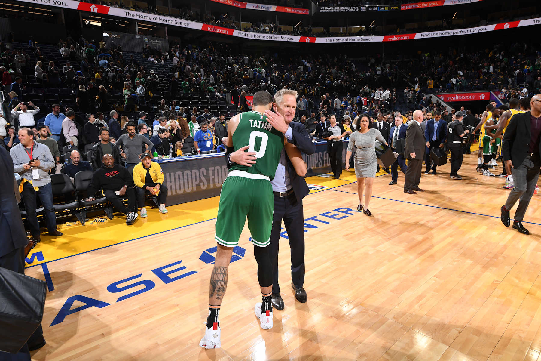 SAN FRANCISCO, CA - NOVEMBER 15: Jayson Tatum #0 of the Boston Celtics hugs Head Coach Steve Kerr iof the Golden State Warriors on November 15, 2019 at Chase Center in San Francisco, California. NOTE TO USER: User expressly acknowledges and agrees that, by downloading and or using this photograph, user is consenting to the terms and conditions of Getty Images License Agreement. Mandatory Copyright Notice: Copyright 2019 NBAE (Photo by Noah Graham/NBAE via Getty Images)