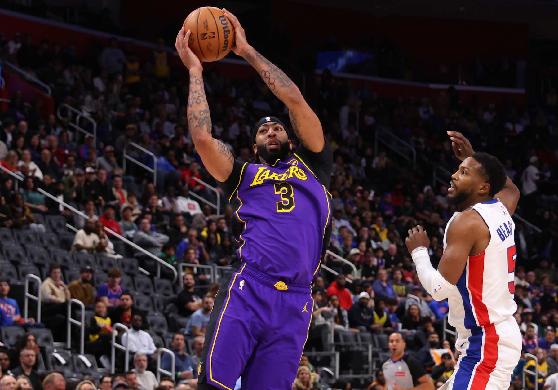 DETROIT, MICHIGAN - NOVEMBER 04: Anthony Davis #3 of the Los Angeles Lakers grabs a rebound past Malik Beasley #5 of the Detroit Pistons during the first quarter at Little Caesars Arena on November 04, 2024 in Detroit, Michigan. NOTE TO USER: User expressly acknowledges and agrees that, by downloading and/or using this photograph, user is consenting to the terms and conditions of the Getty Images License Agreement.  (Photo by Gregory Shamus/Getty Images)