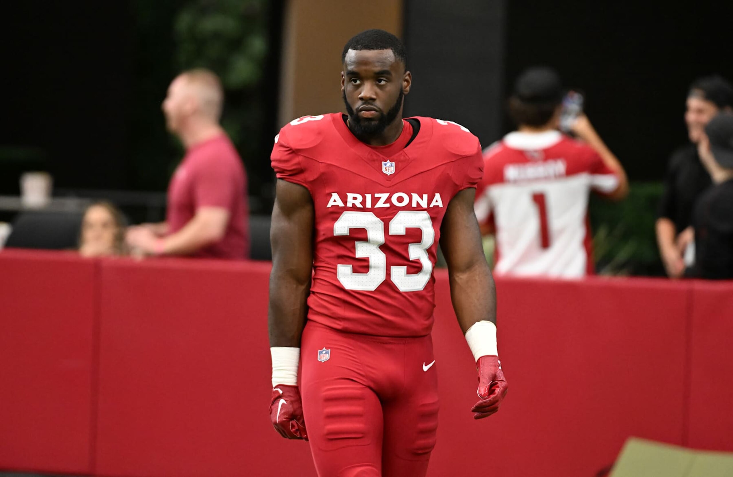 GLENDALE, ARIZONA - SEPTEMBER 15: Trey Benson #33 of the Arizona Cardinals prepares for a game against the Los Angeles Rams at State Farm Stadium on September 15, 2024 in Glendale, Arizona. (Photo by Norm Hall/Getty Images) GLENDALE, ARIZONA - SEPTEMBER 15: Trey Benson #33 of the Arizona Cardinals prepares for a game against the Los Angeles Rams at State Farm Stadium on September 15, 2024 in Glendale, Arizona. (Photo by Norm Hall/Getty Images)